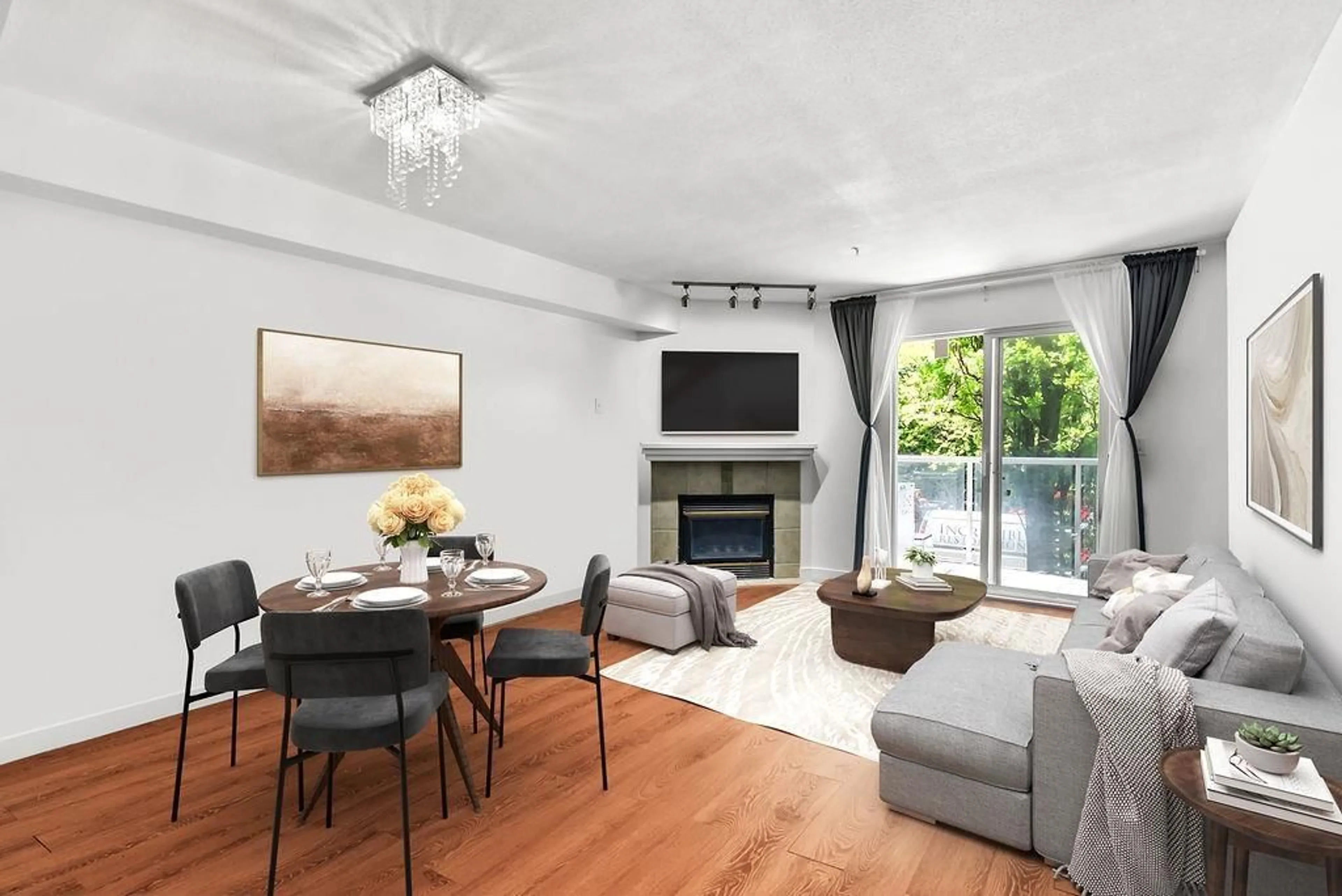 Living room with furniture, wood/laminate floor for 217 - 8110 120A, Surrey British Columbia V3W3P3