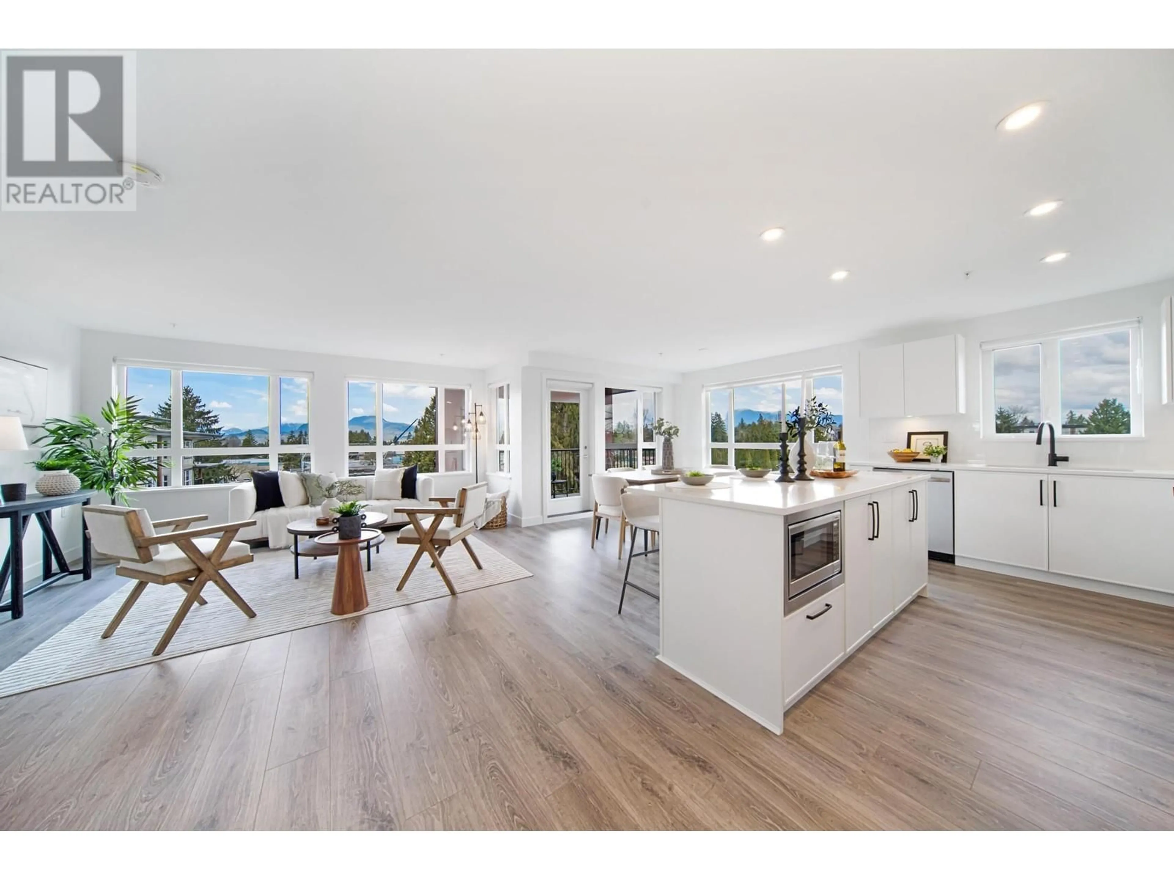 Open concept kitchen, wood/laminate floor for 507 - 22575 BROWN AVENUE, Maple Ridge British Columbia V2X3R6