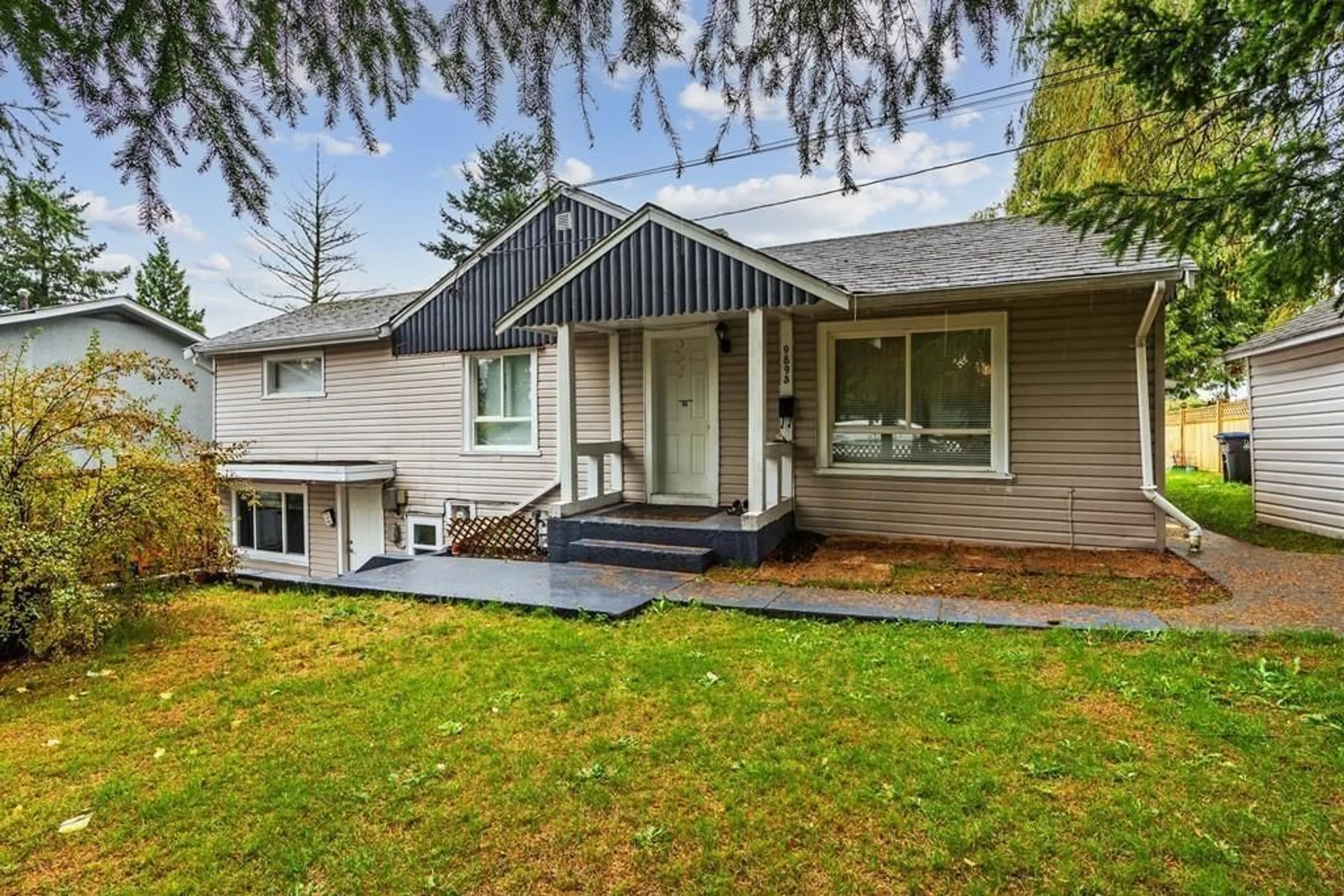 Home with vinyl exterior material, street for 9893 132, Surrey British Columbia V3T3S7