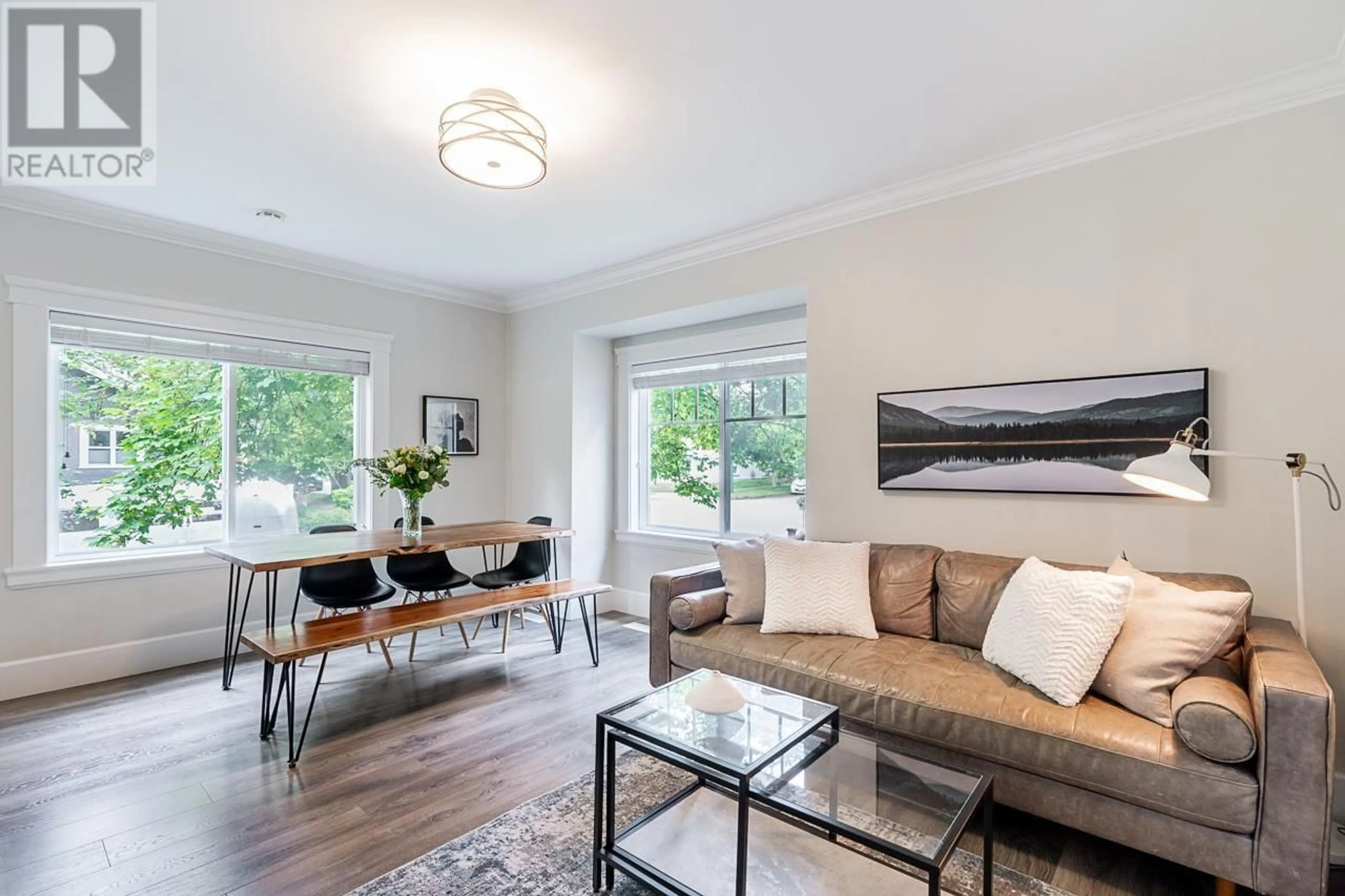 Living room with furniture, wood/laminate floor for 3925 INVERNESS STREET, Vancouver British Columbia V5V4W4