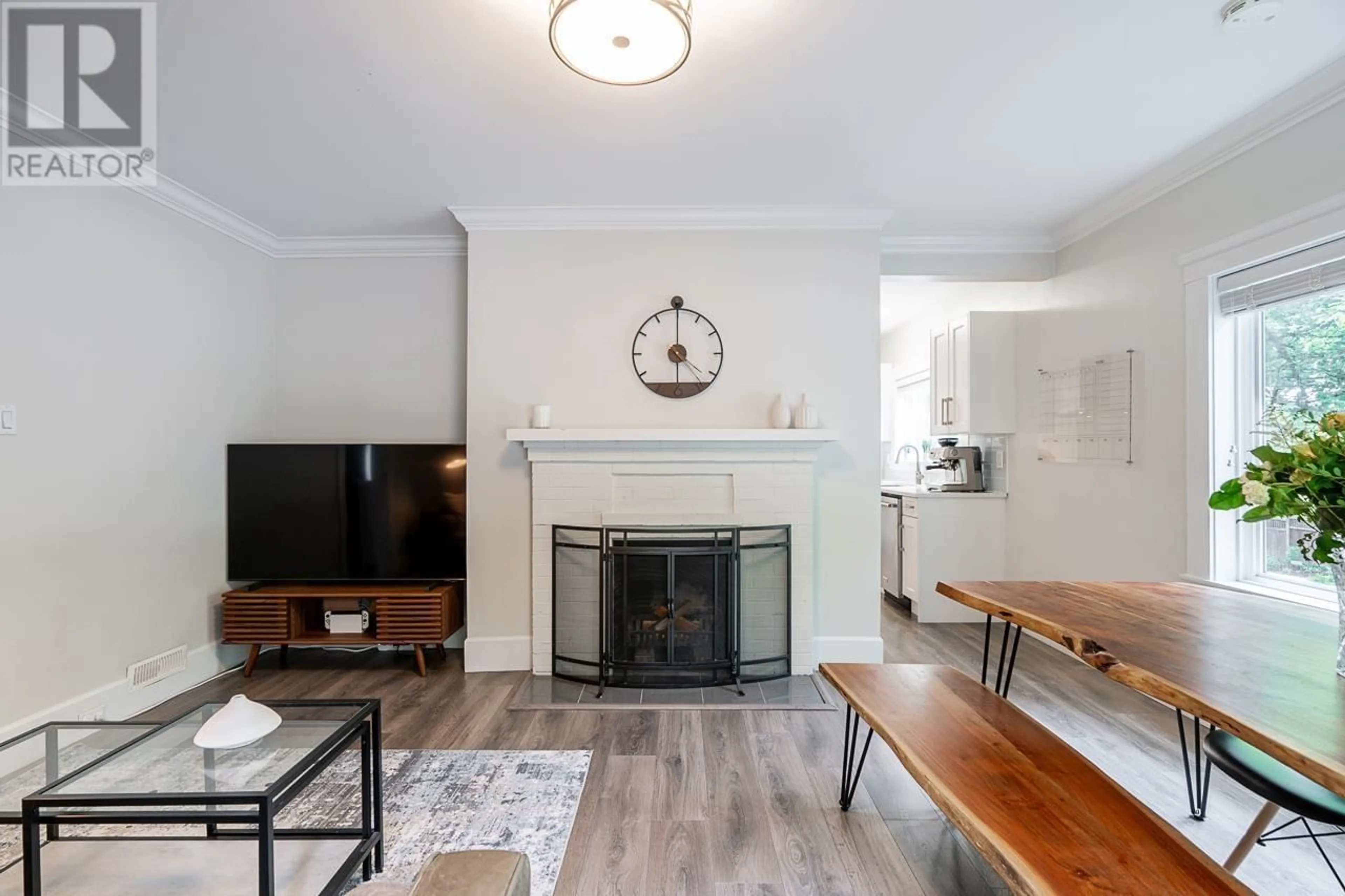 Living room with furniture, wood/laminate floor for 3925 INVERNESS STREET, Vancouver British Columbia V5V4W4