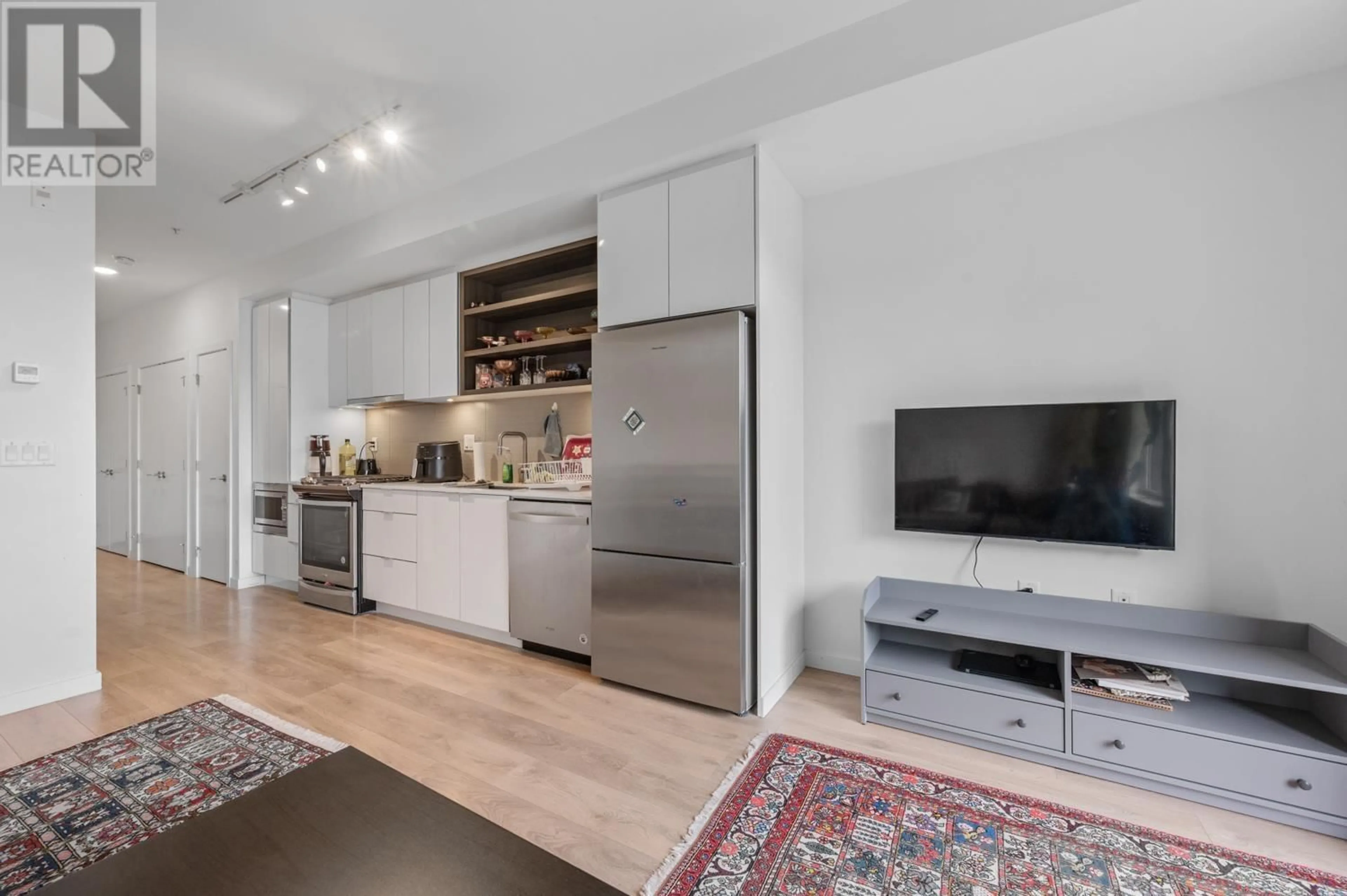 Open concept kitchen, unknown for 409 - 725 MARINE DRIVE, North Vancouver British Columbia V7M0G2