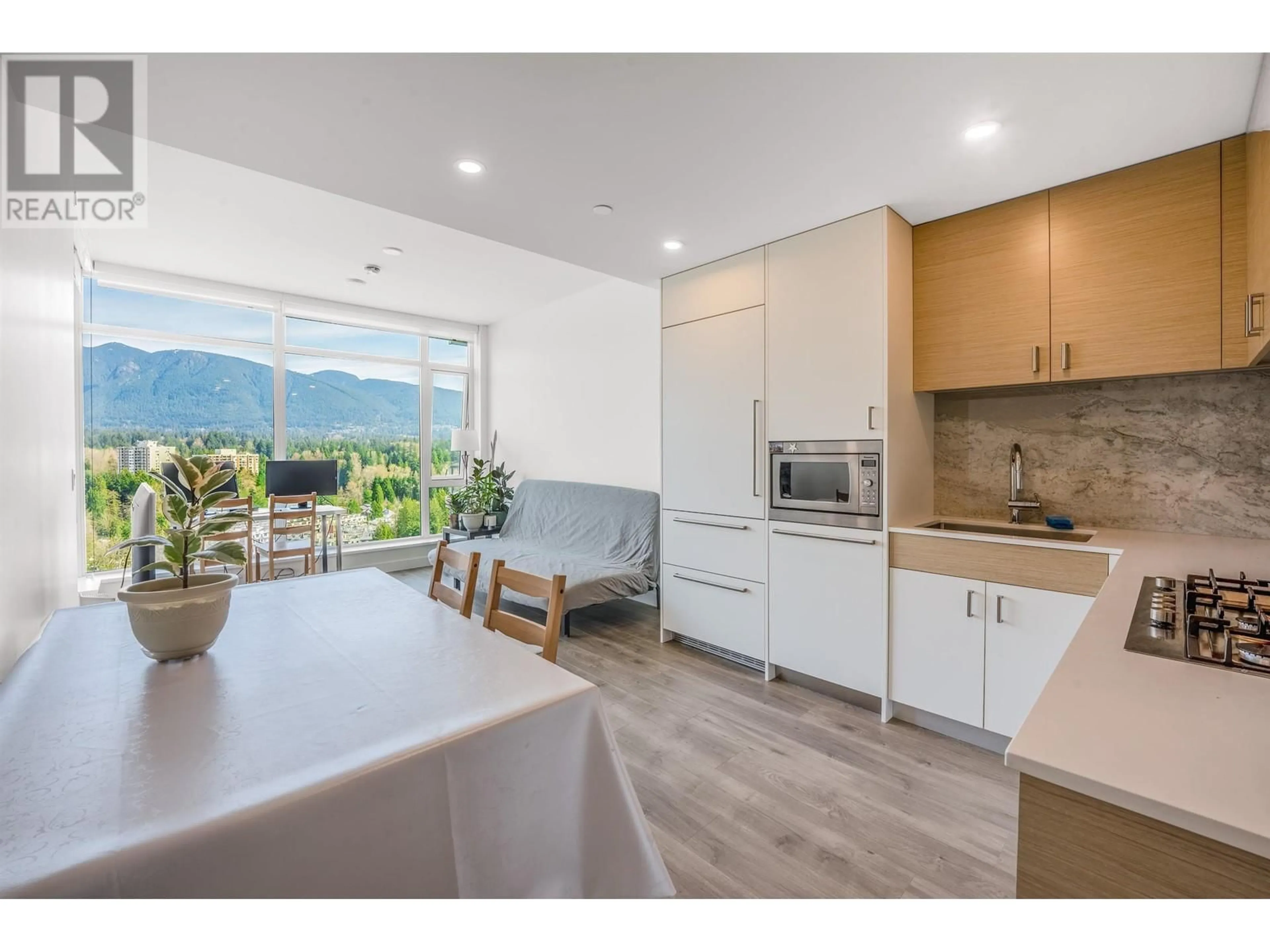 Open concept kitchen, wood/laminate floor for 2001 - 200 KLAHANIE COURT, West Vancouver British Columbia V7P0E4