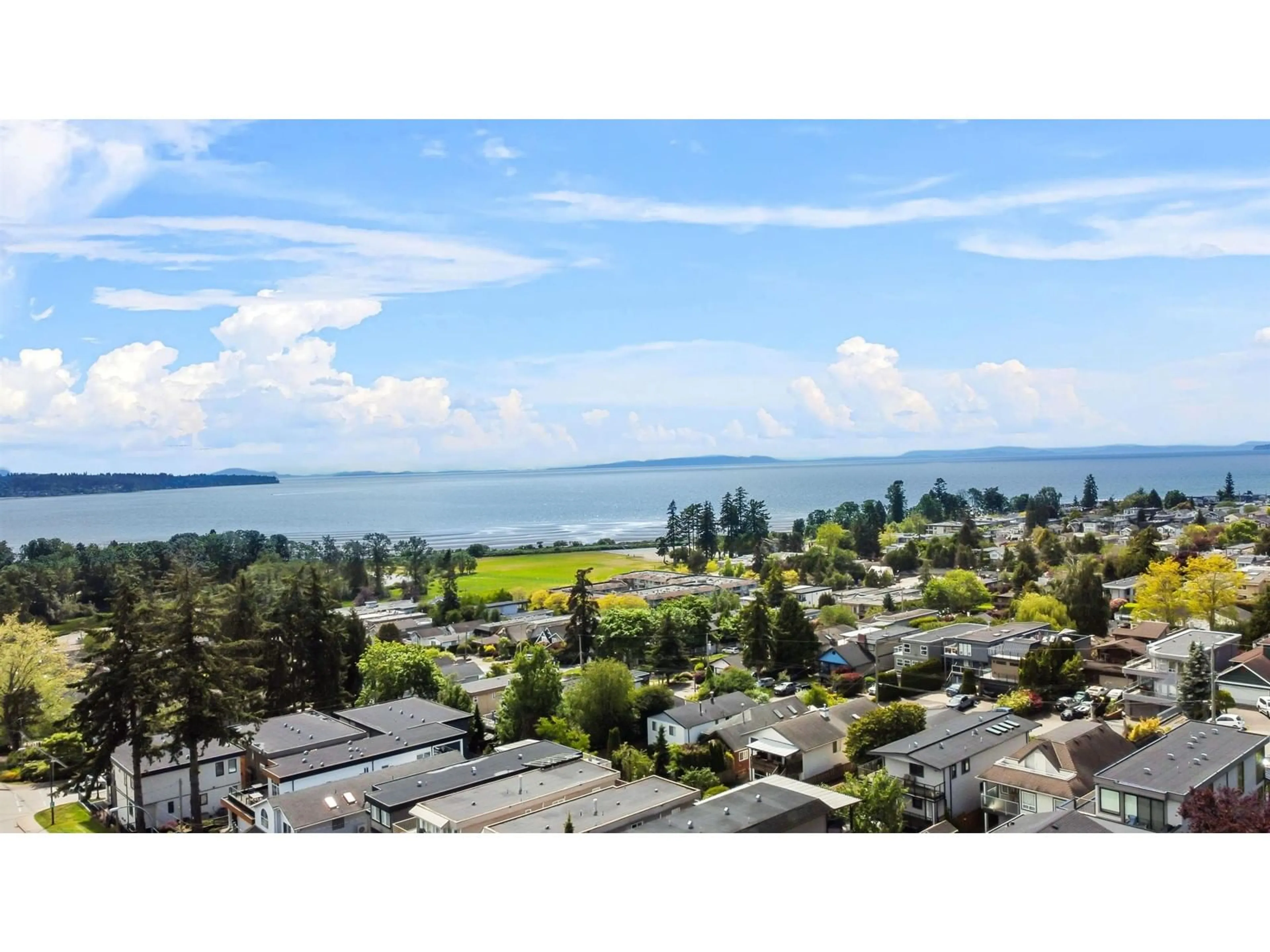 A pic from outside/outdoor area/front of a property/back of a property/a pic from drone, water/lake/river/ocean view for 16019 9A, Surrey British Columbia V4A4W5