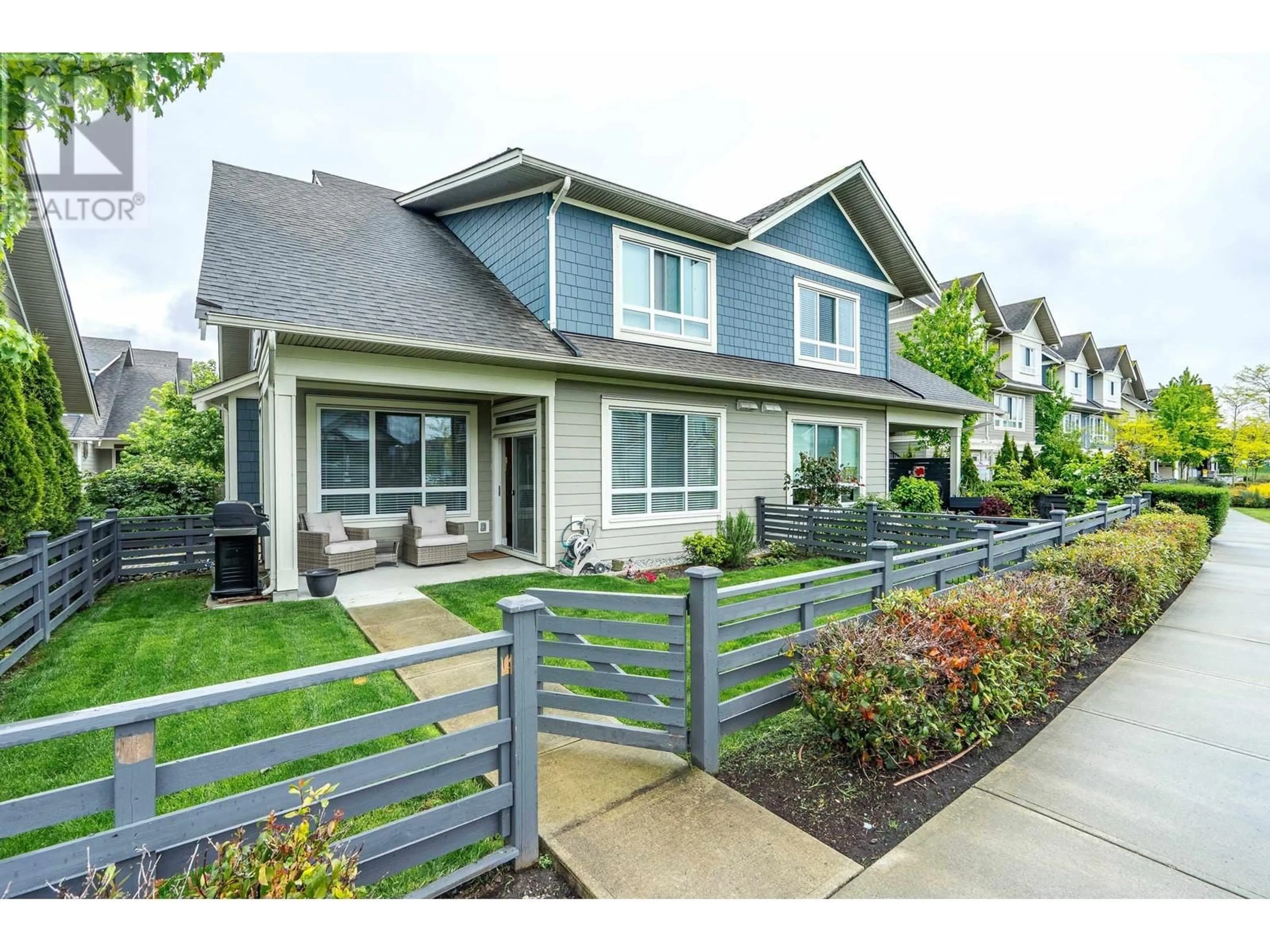 Home with vinyl exterior material, street for 203 - 1816 OSPREY DRIVE, Tsawwassen British Columbia V4M0B8