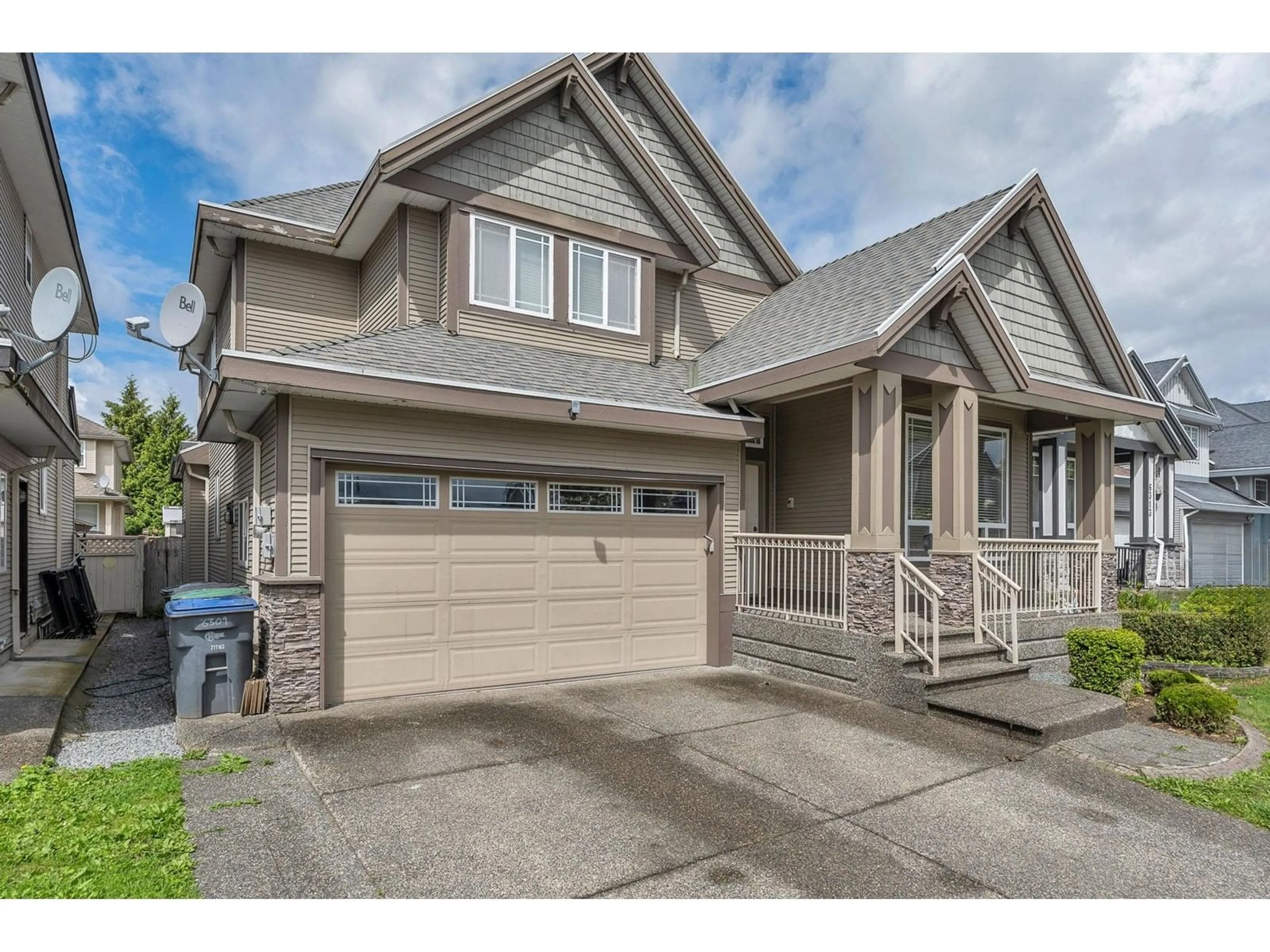 Home with vinyl exterior material, street for 6309 167B, Surrey British Columbia V3S1X3