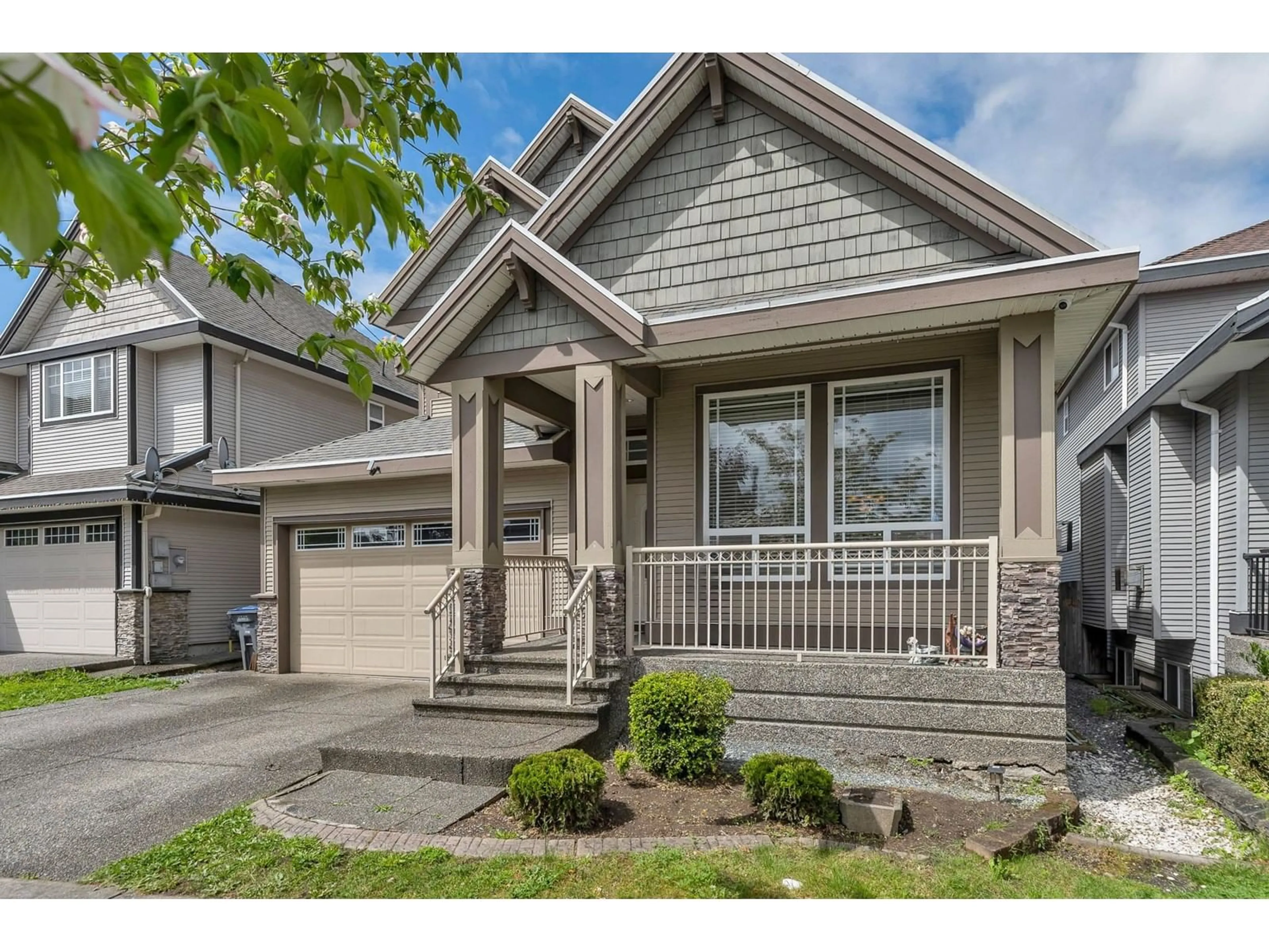 Home with vinyl exterior material, street for 6309 167B, Surrey British Columbia V3S1X3