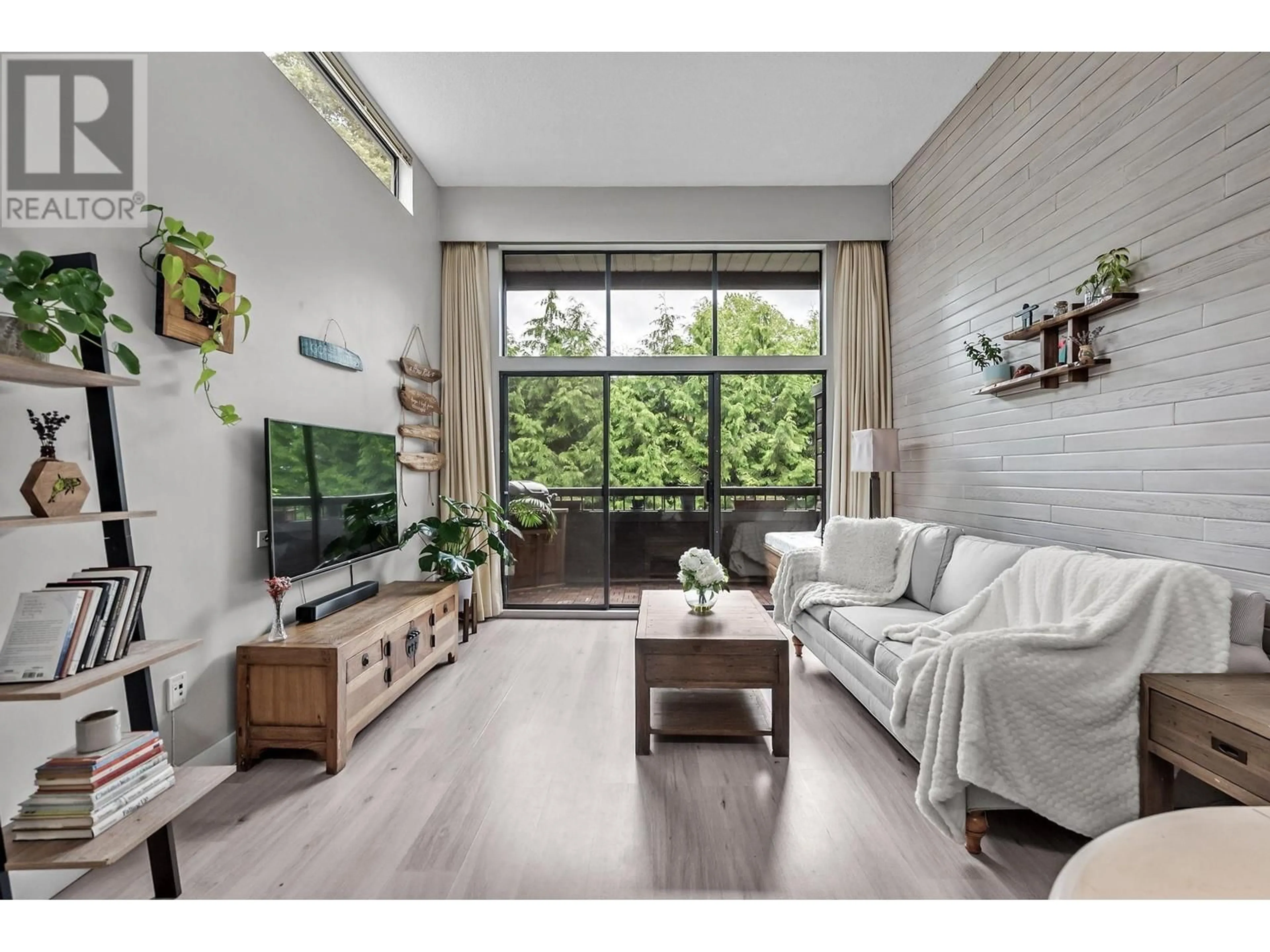 Living room with furniture, wood/laminate floor for 307 - 2255 8TH AVENUE, Vancouver British Columbia V6K2A6