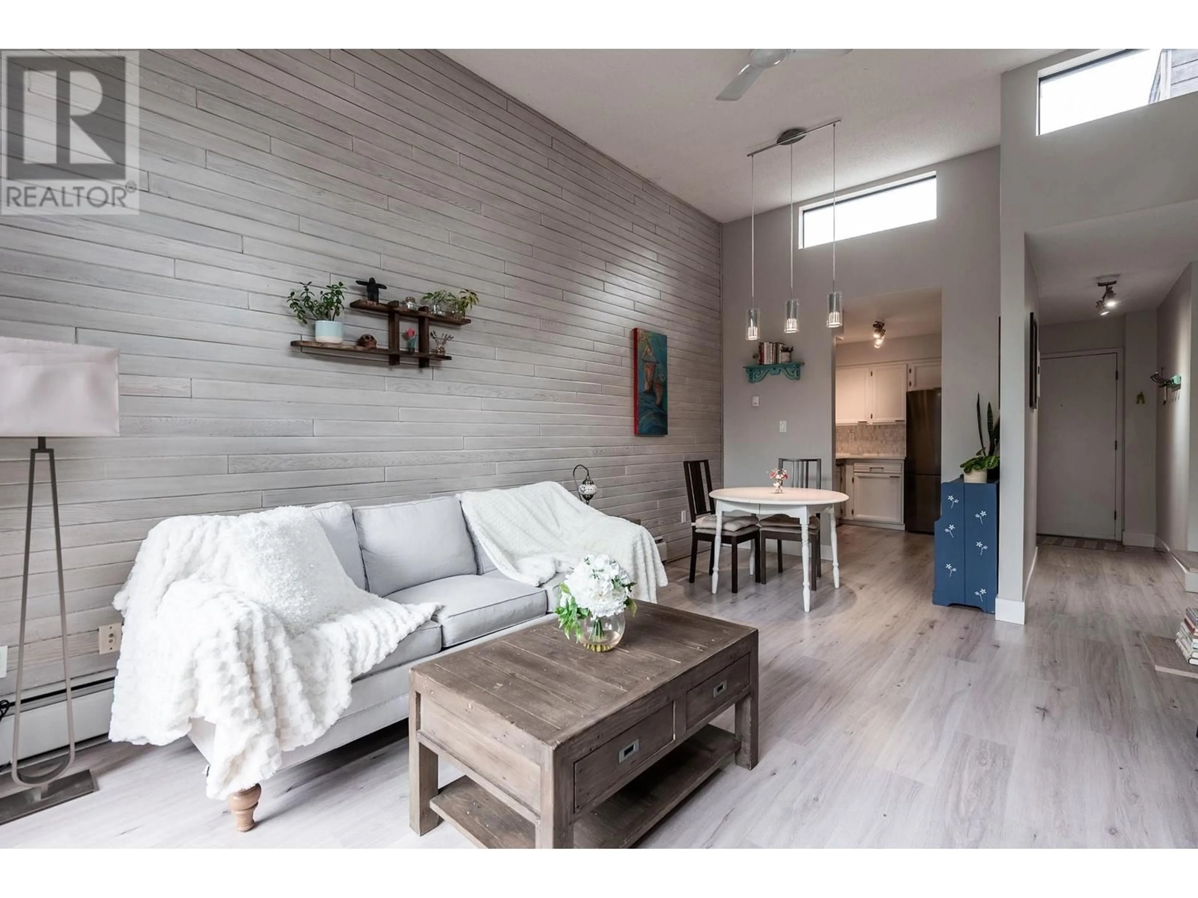 Living room with furniture, wood/laminate floor for 307 - 2255 8TH AVENUE, Vancouver British Columbia V6K2A6