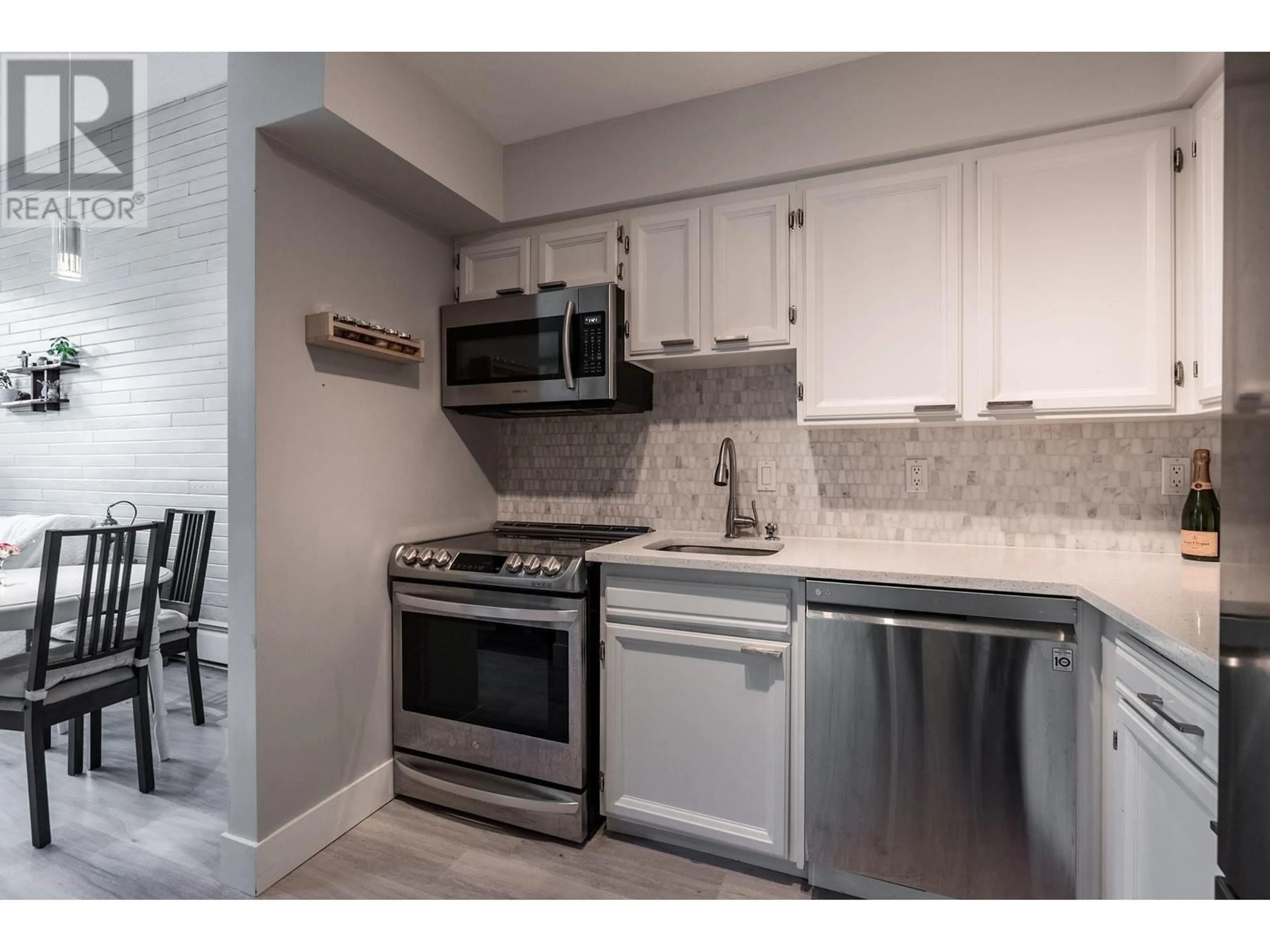 Standard kitchen, ceramic/tile floor for 307 - 2255 8TH AVENUE, Vancouver British Columbia V6K2A6