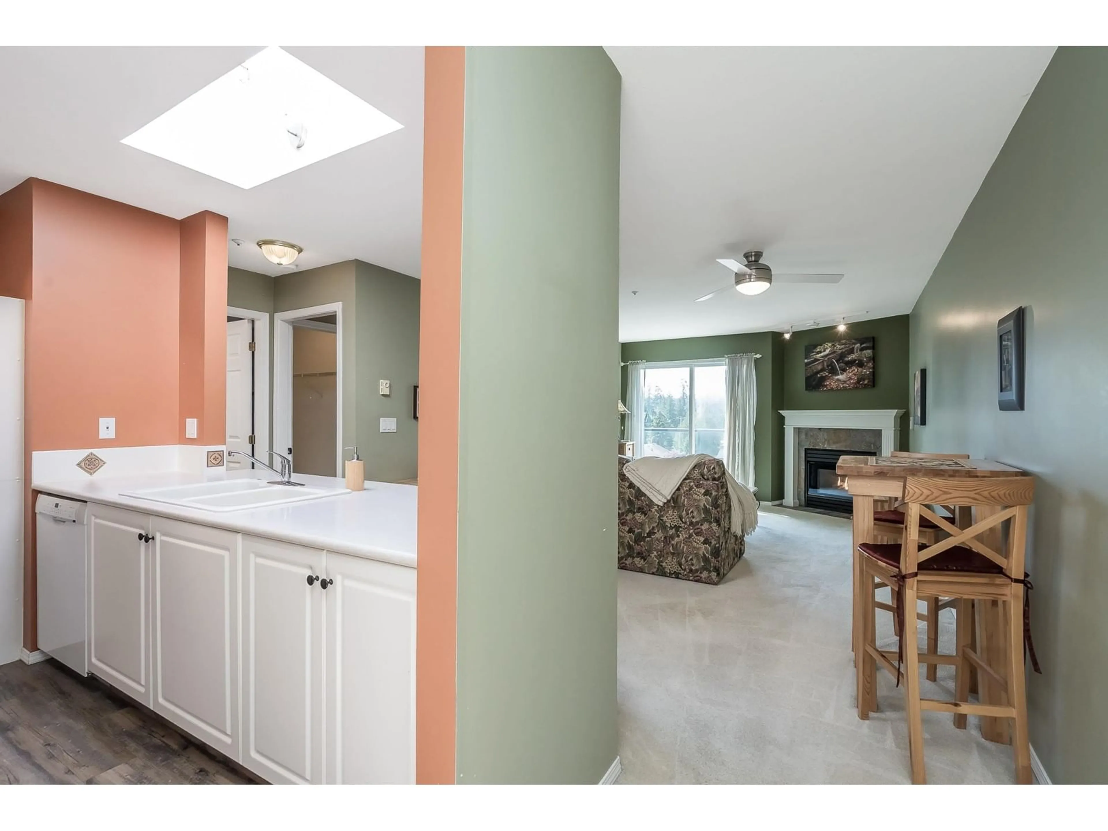 Open concept kitchen, ceramic/tile floor for 405 - 20277 53RD, Langley British Columbia V3A3V2