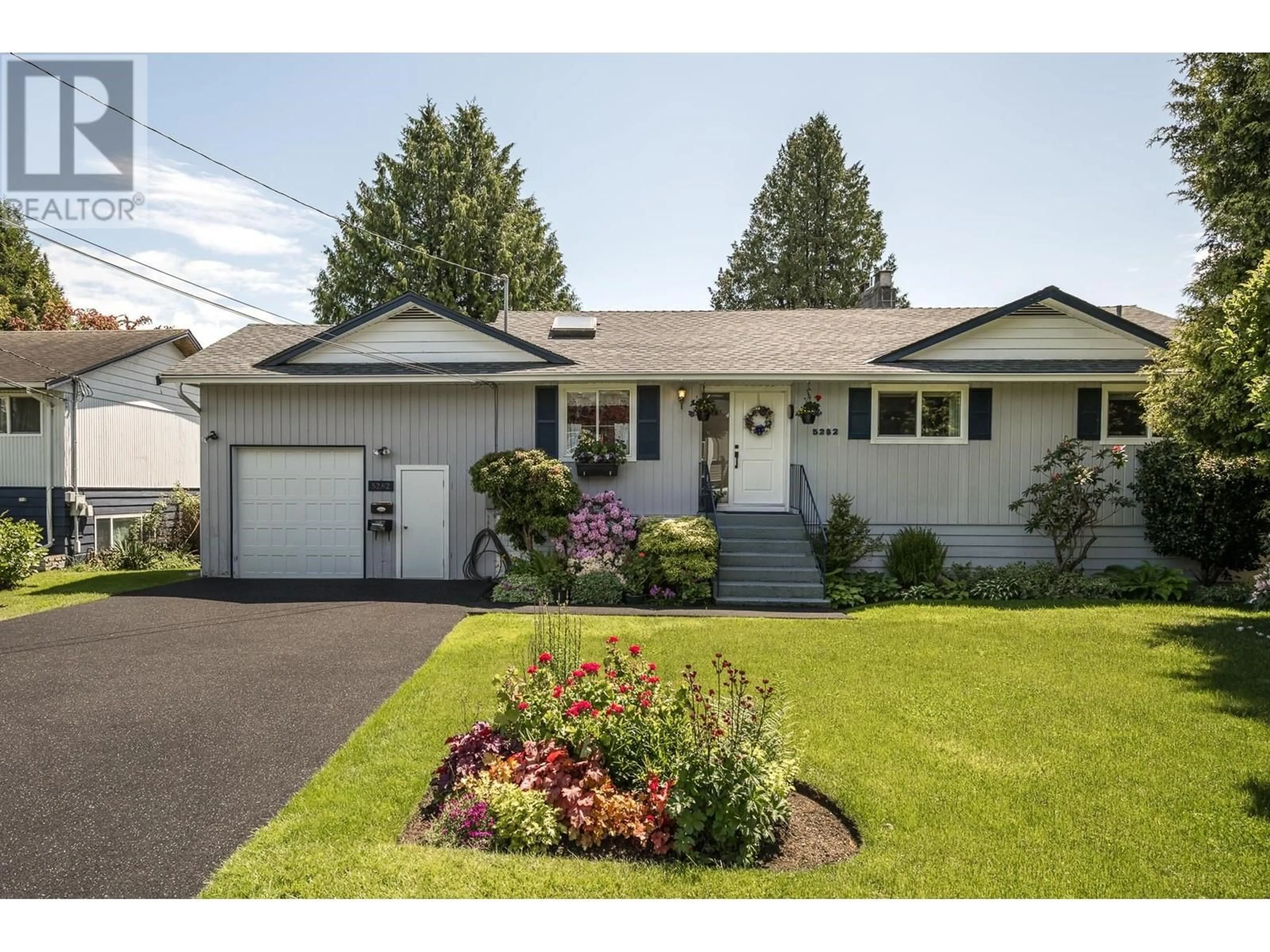 Home with vinyl exterior material, street for 5282 SARATOGA DRIVE, Delta British Columbia V4M2E9