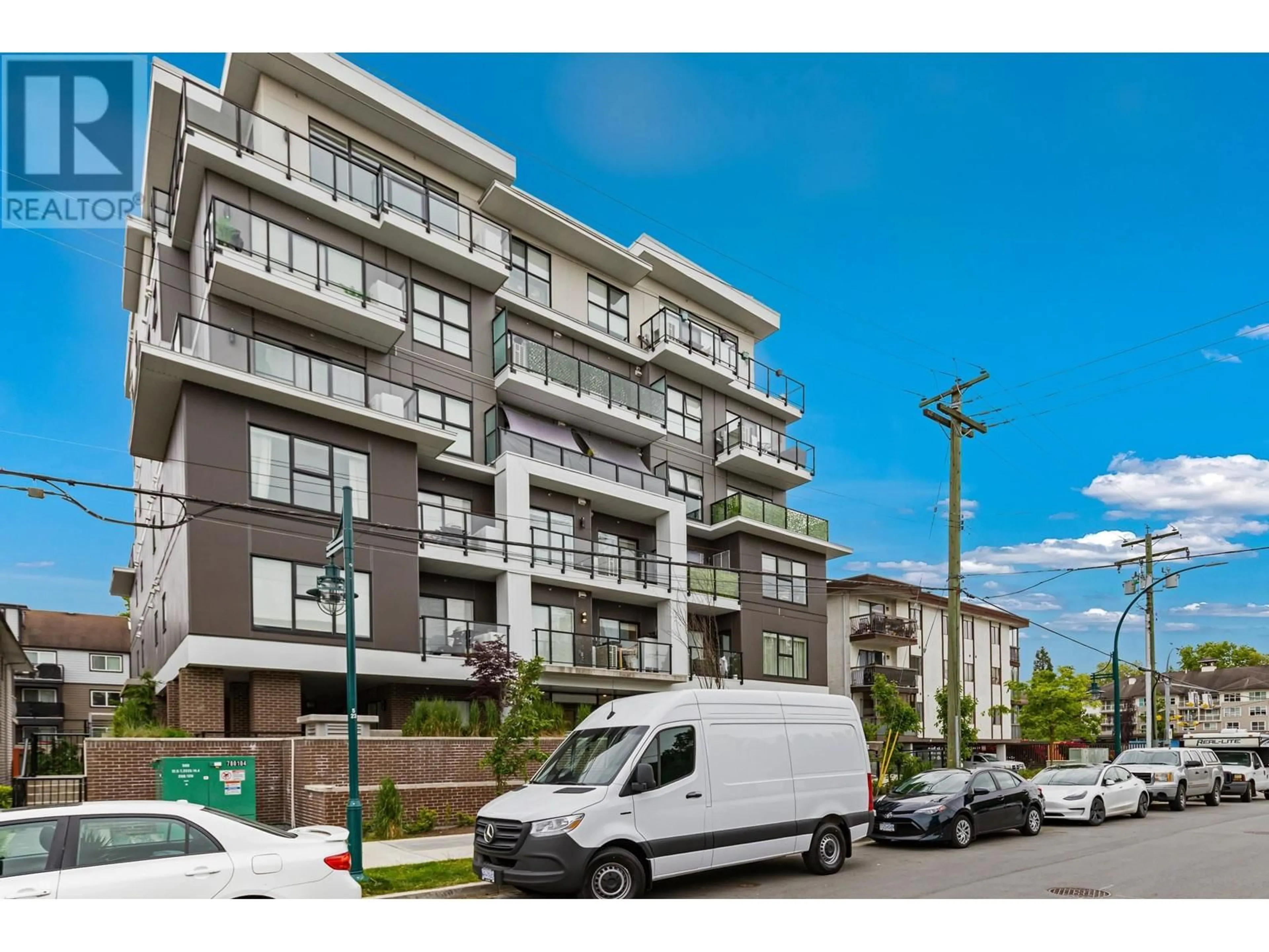 A pic from outside/outdoor area/front of a property/back of a property/a pic from drone, street for 204 - 2331 KELLY AVENUE, Port Coquitlam British Columbia V3C1Y3