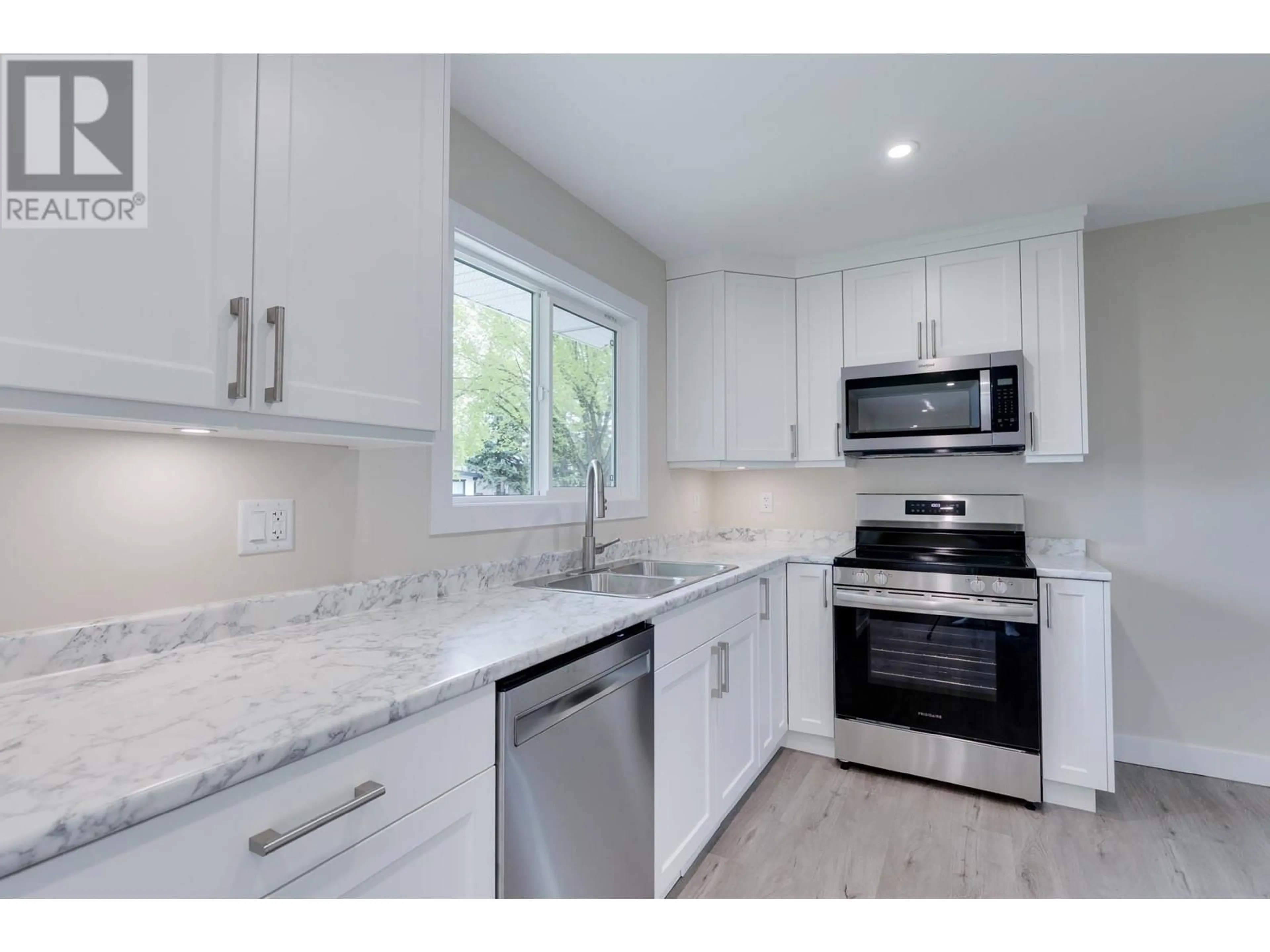 Open concept kitchen, ceramic/tile floor for 151 FERN CRESCENT, Prince George British Columbia V2N1J3
