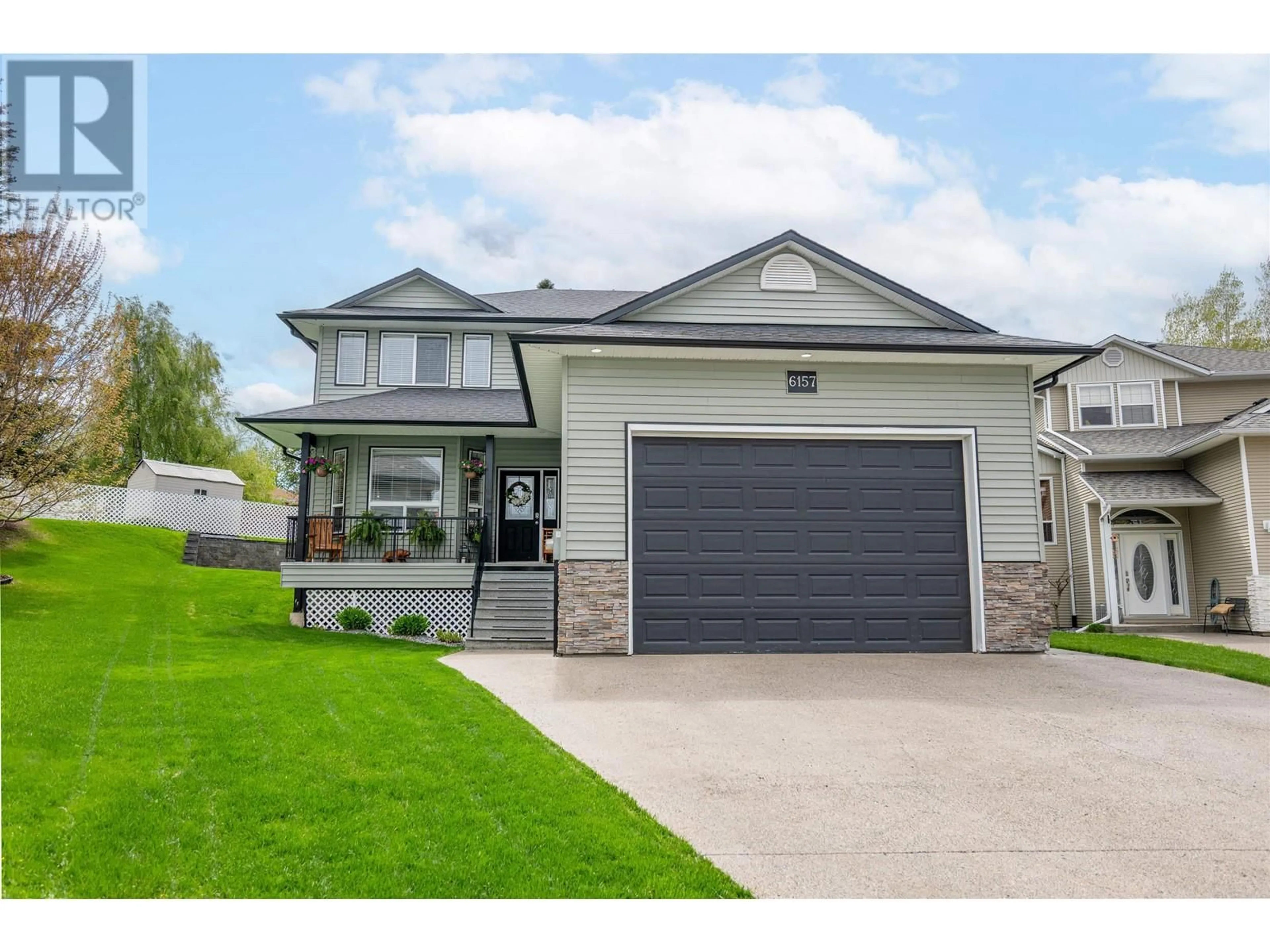 Home with vinyl exterior material, street for 6157 NARINDER PLACE, Prince George British Columbia V2K0A2