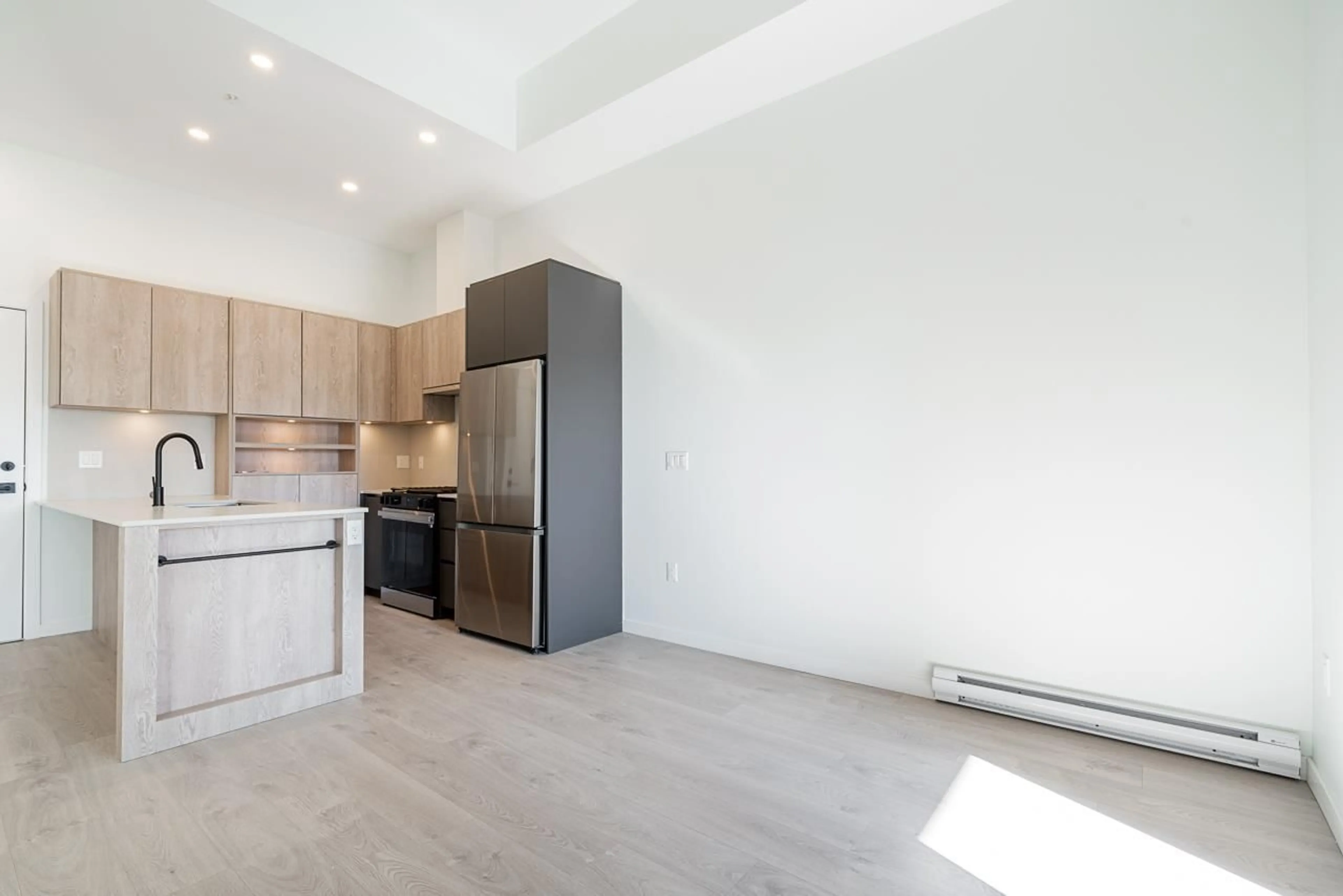 Open concept kitchen, unknown for 104 - 19577 65B, Surrey British Columbia V4N6Y3