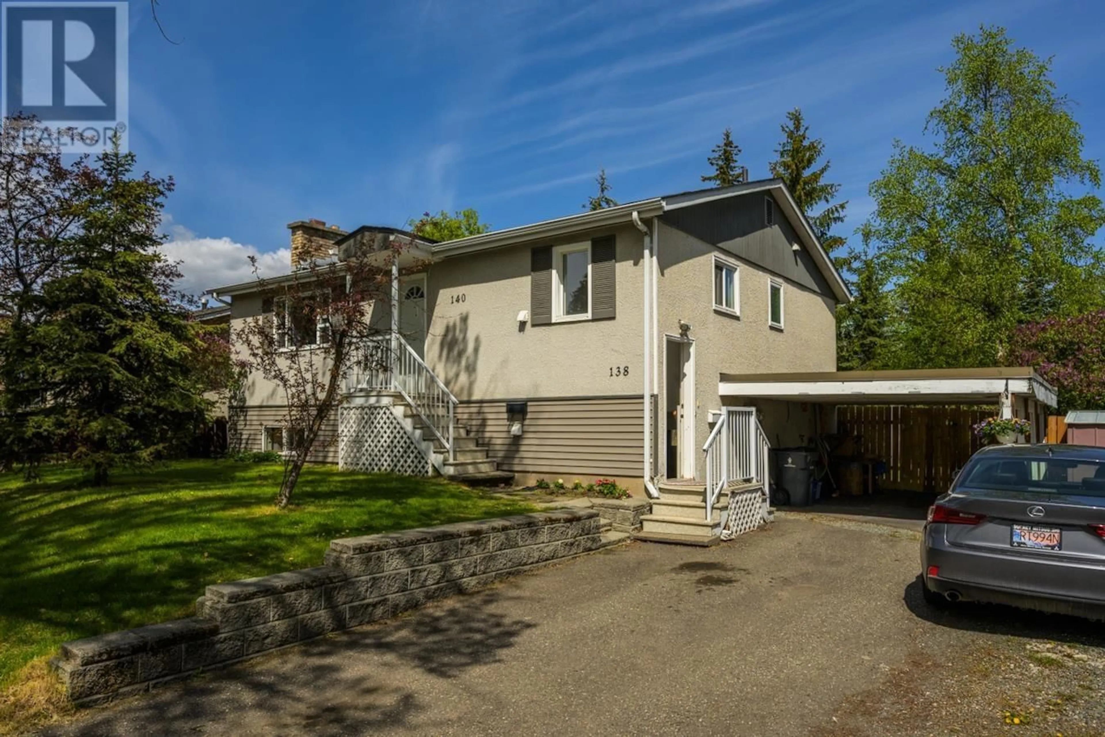 A pic from outside/outdoor area/front of a property/back of a property/a pic from drone, street for 138 - 140 AITKEN CRESCENT, Prince George British Columbia V2L4N1