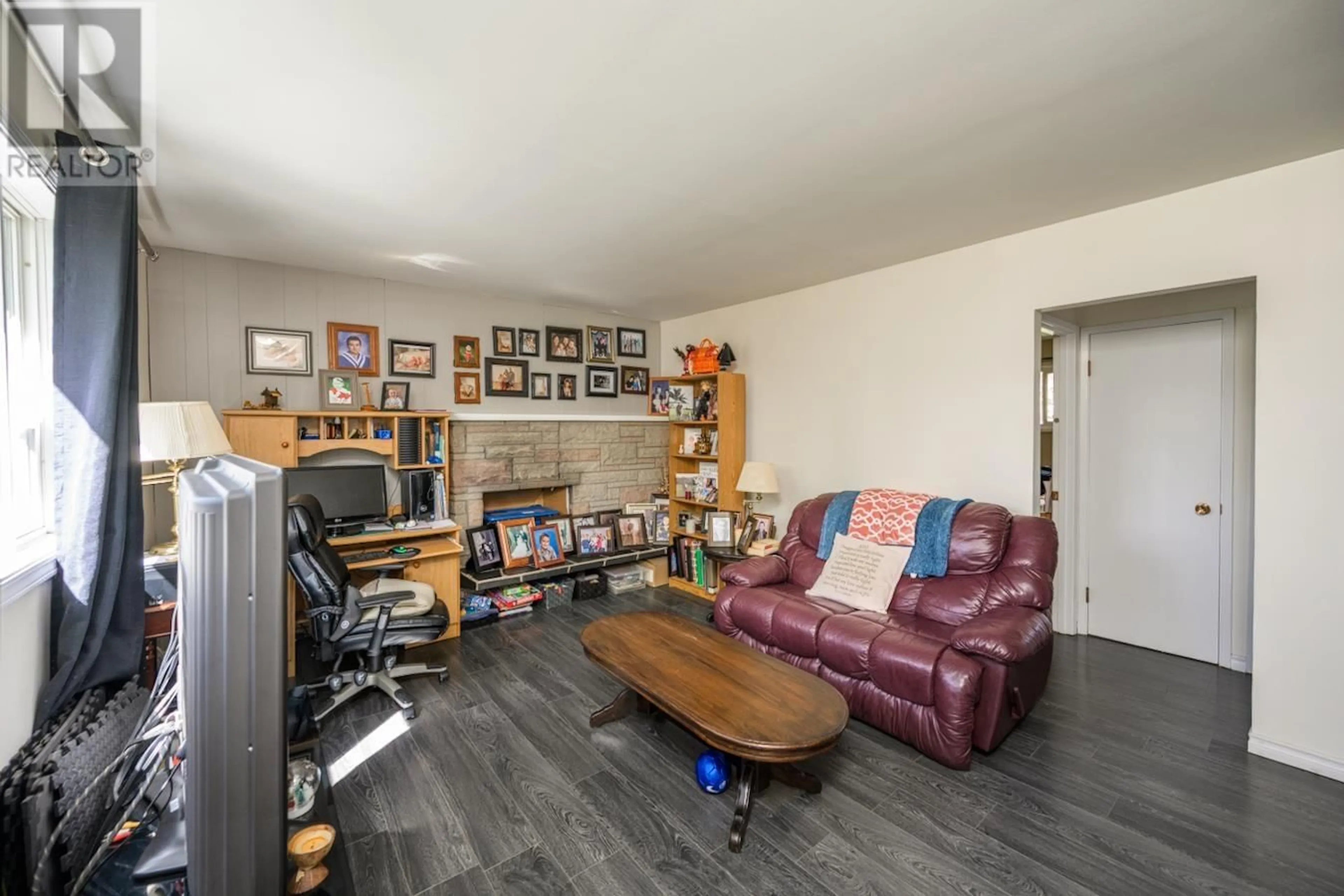 Living room with furniture, wood/laminate floor for 138 - 140 AITKEN CRESCENT, Prince George British Columbia V2L4N1