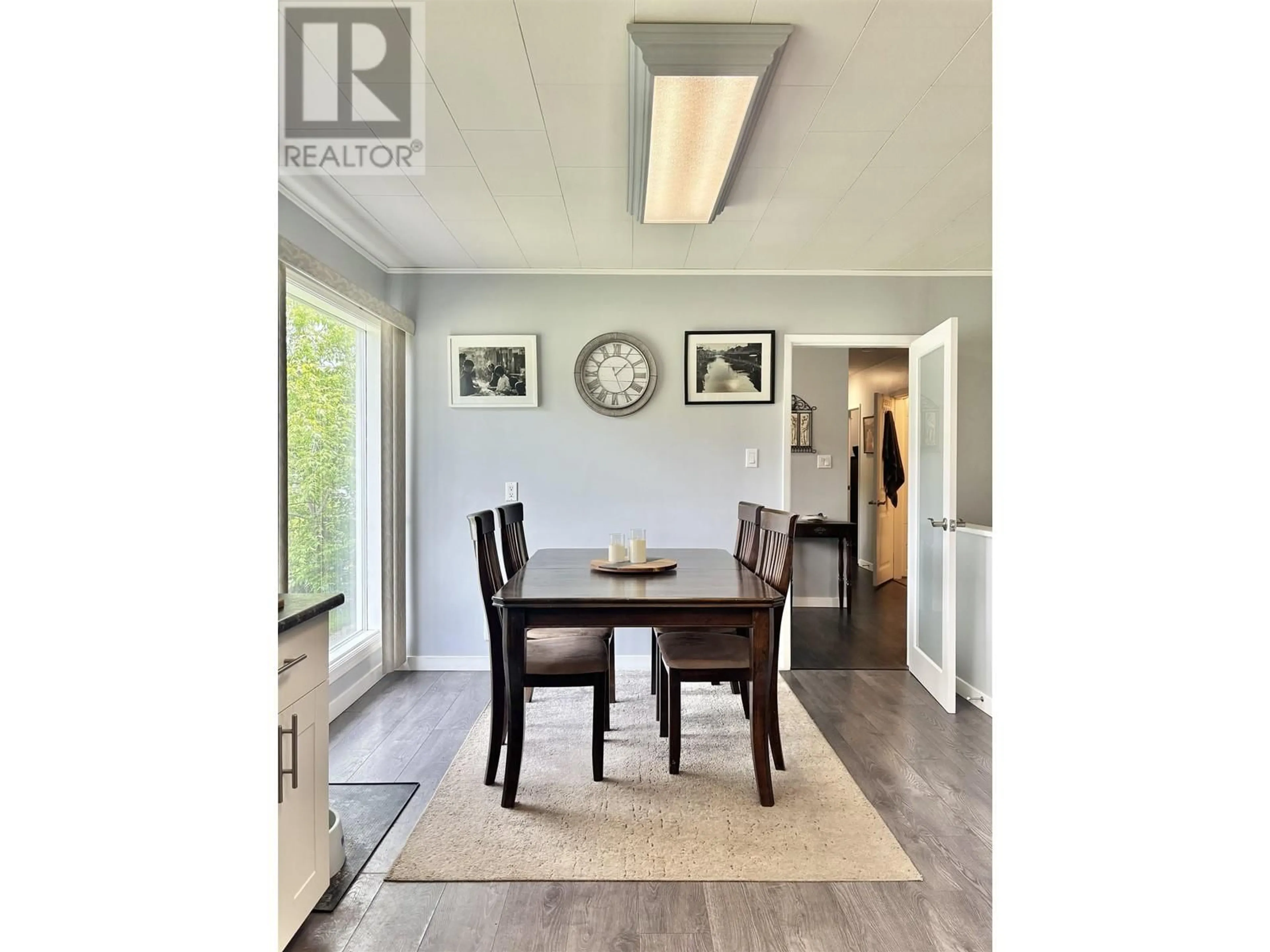 Dining room, wood/laminate floor for 711 WESTERN AVENUE, Williams Lake British Columbia V2G2J2
