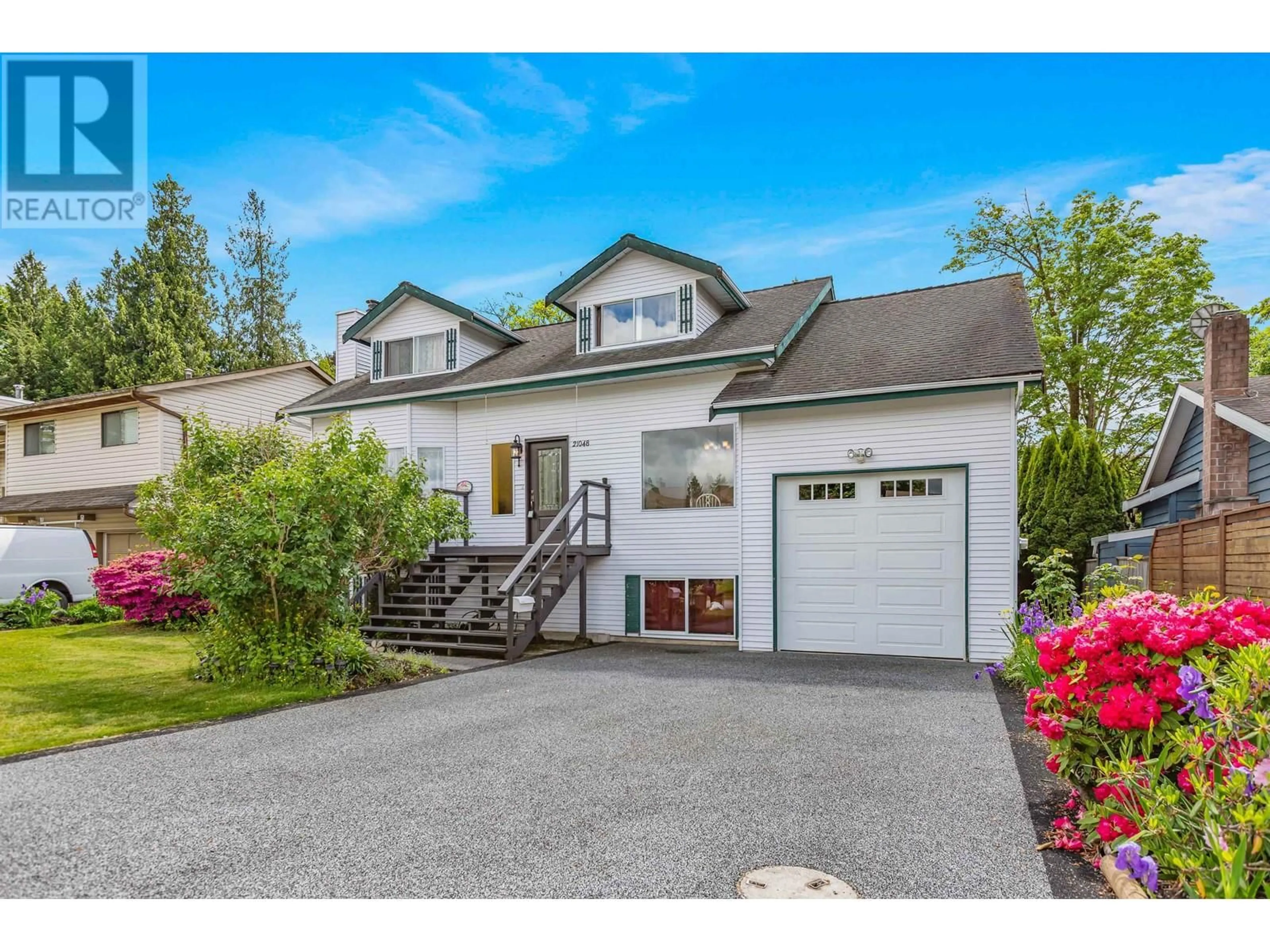 Home with vinyl exterior material, street for 21048 BARKER AVENUE, Maple Ridge British Columbia V2X8R6