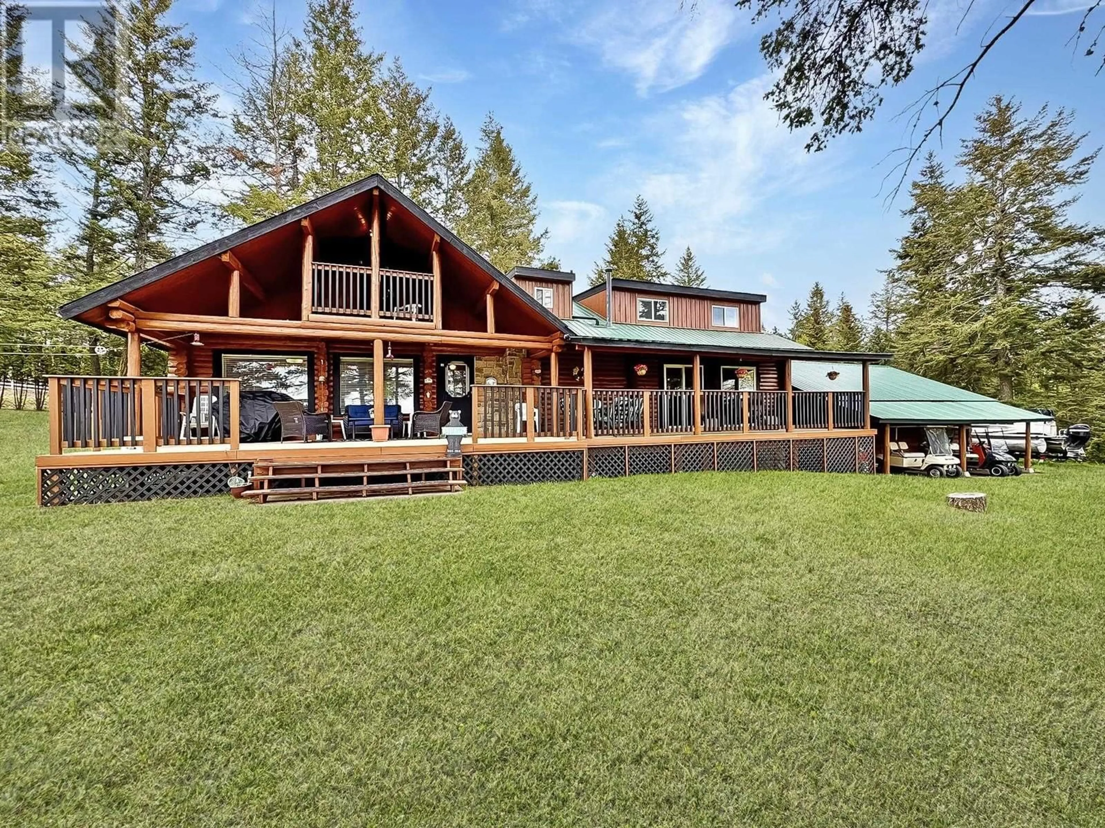 A pic from outside/outdoor area/front of a property/back of a property/a pic from drone, unknown for 4834 TELQUA DRIVE, 108 Mile Ranch British Columbia V0K2Z0