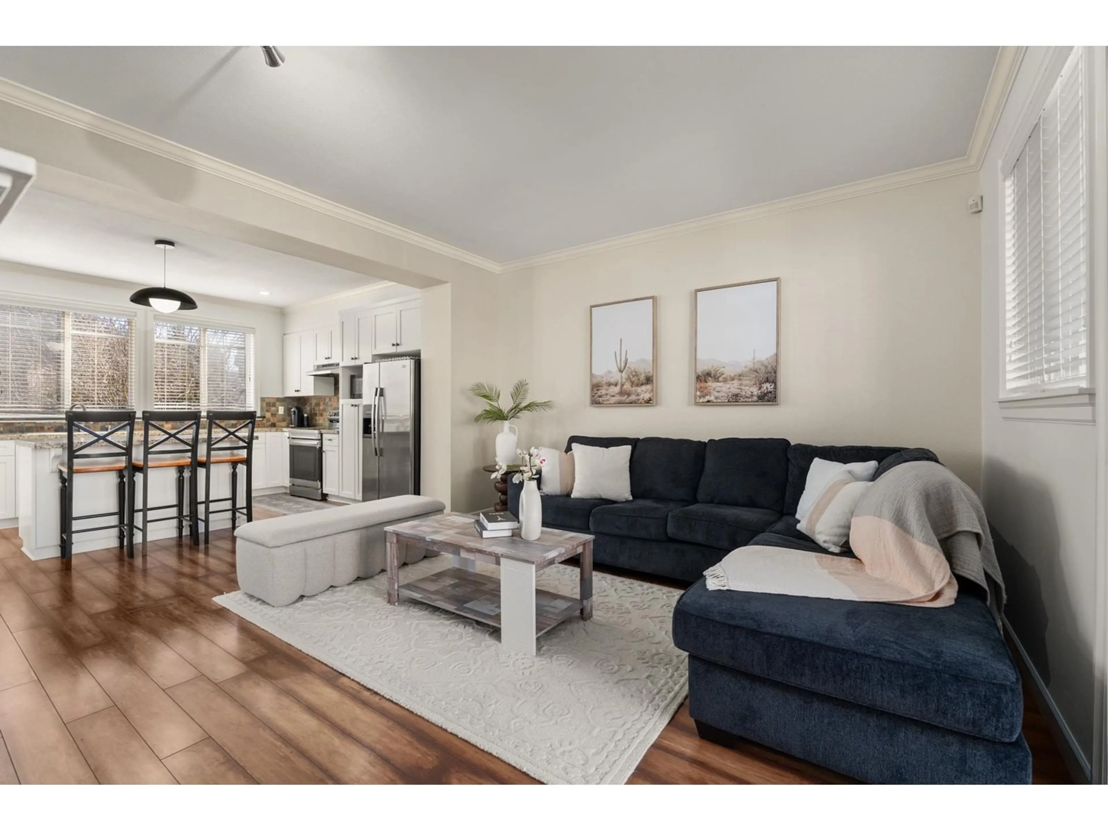 Living room with furniture, wood/laminate floor for 12 - 7168 179, Surrey British Columbia V3S8C5