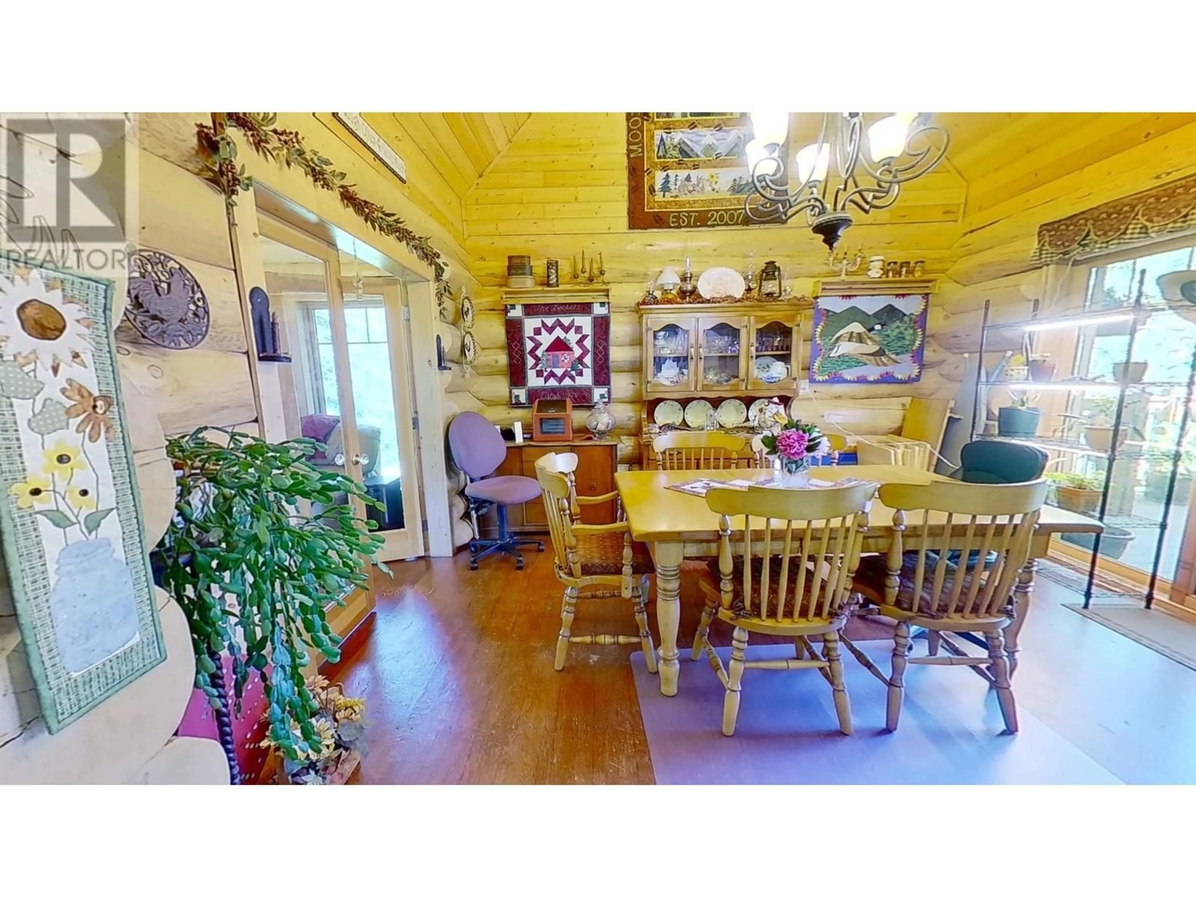 Dining room, wood/laminate floor for 13711 283 ROAD, Fort St. John British Columbia V1J8L7