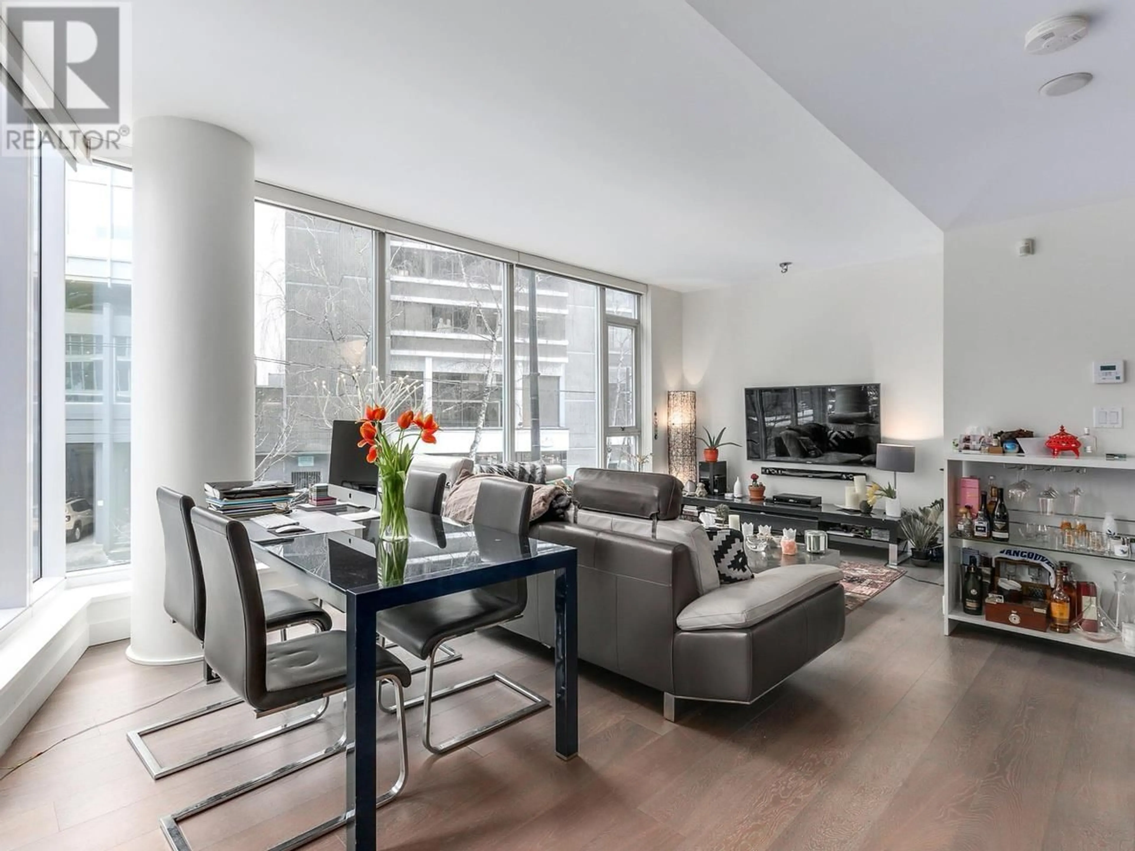 Living room with furniture, unknown for 302 - 1499 PENDER STREET, Vancouver British Columbia V6G0A7