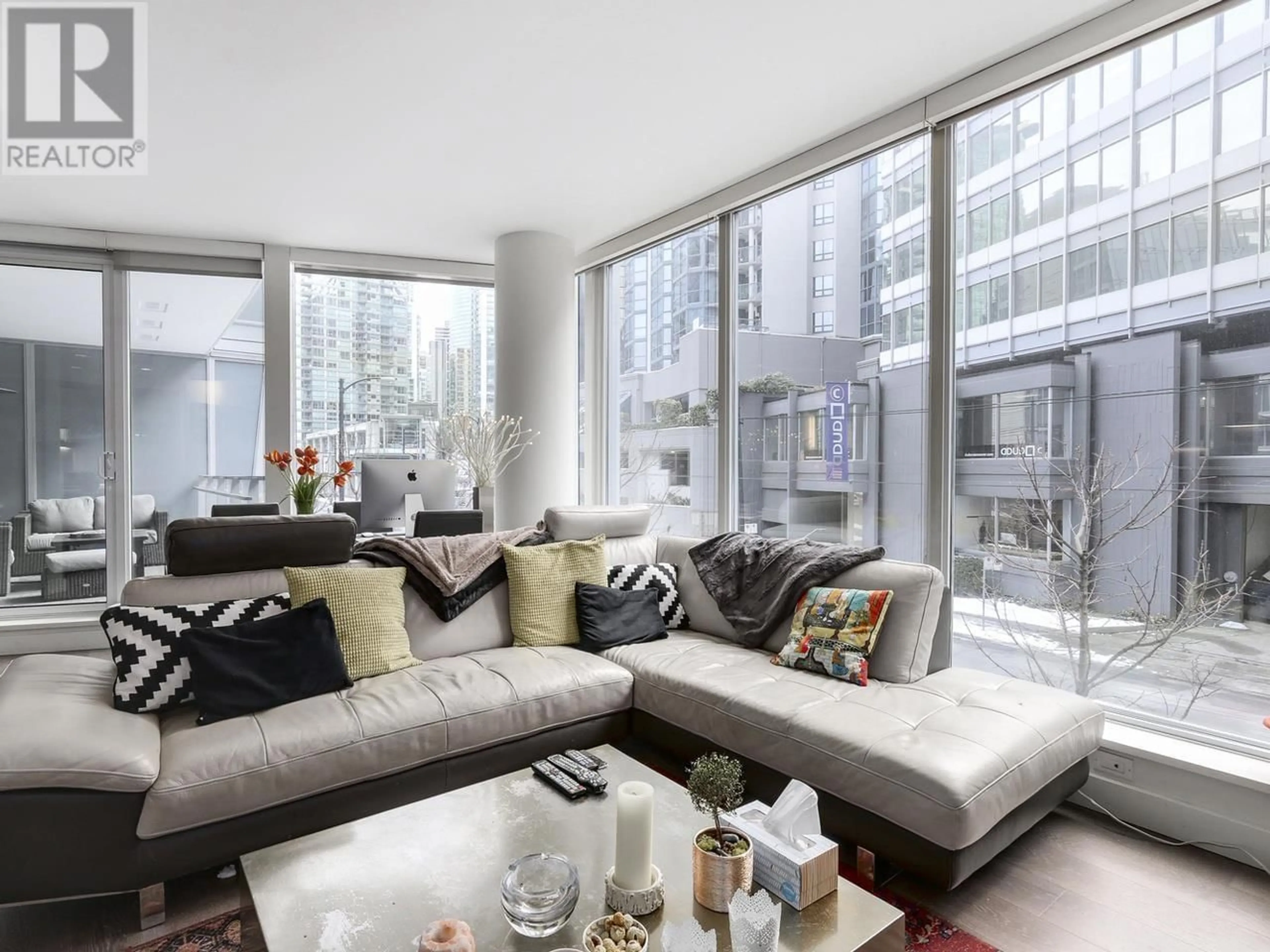 Living room with furniture, unknown for 302 - 1499 PENDER STREET, Vancouver British Columbia V6G0A7