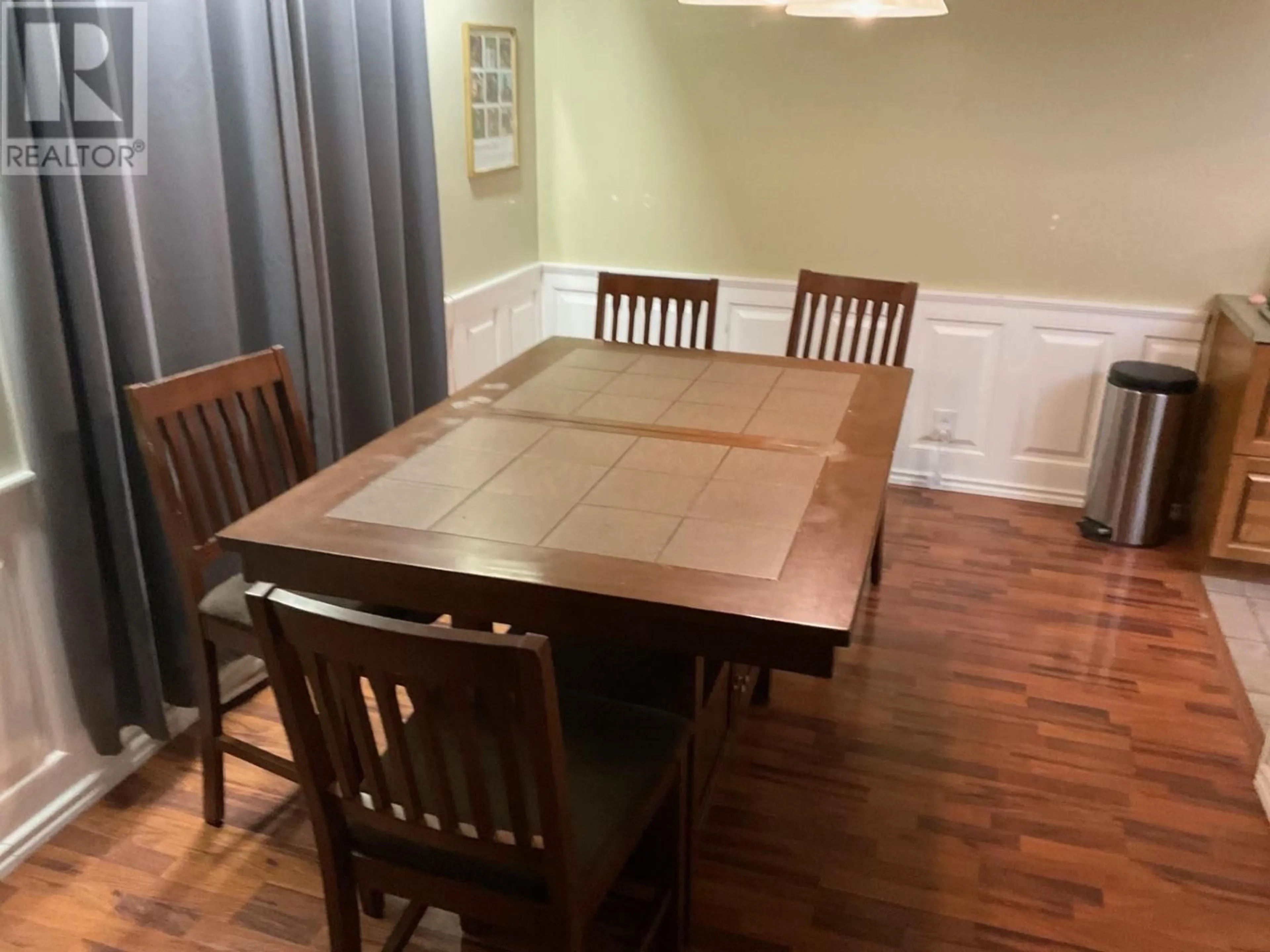 Dining room, wood/laminate floor for 10412 112 AVENUE, Fort St. John British Columbia V1J2W7