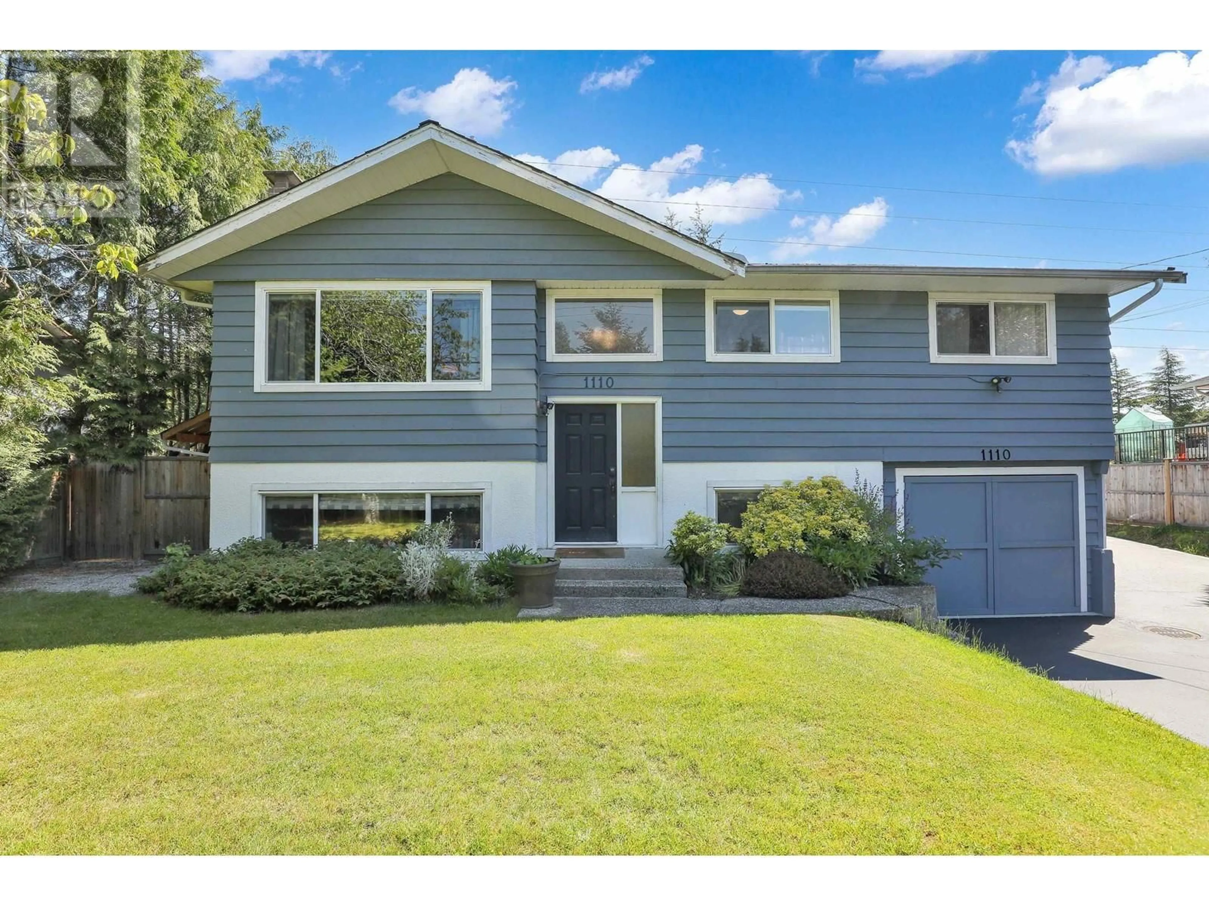 Home with vinyl exterior material, street for 1110 53A STREET, Delta British Columbia V4M3E3