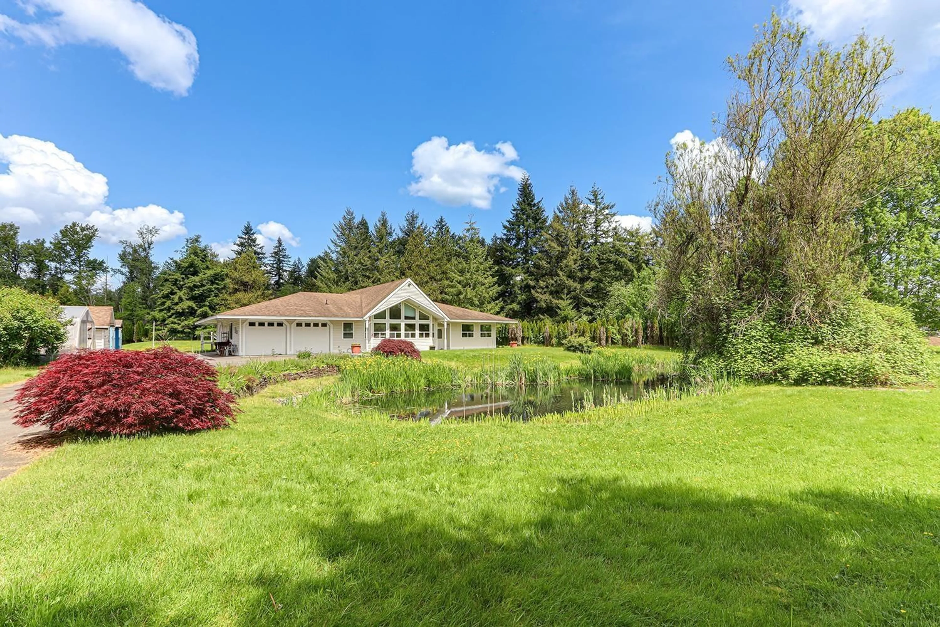 A pic from outside/outdoor area/front of a property/back of a property/a pic from drone, unknown for 22279 57A, Langley British Columbia V2Y2L9