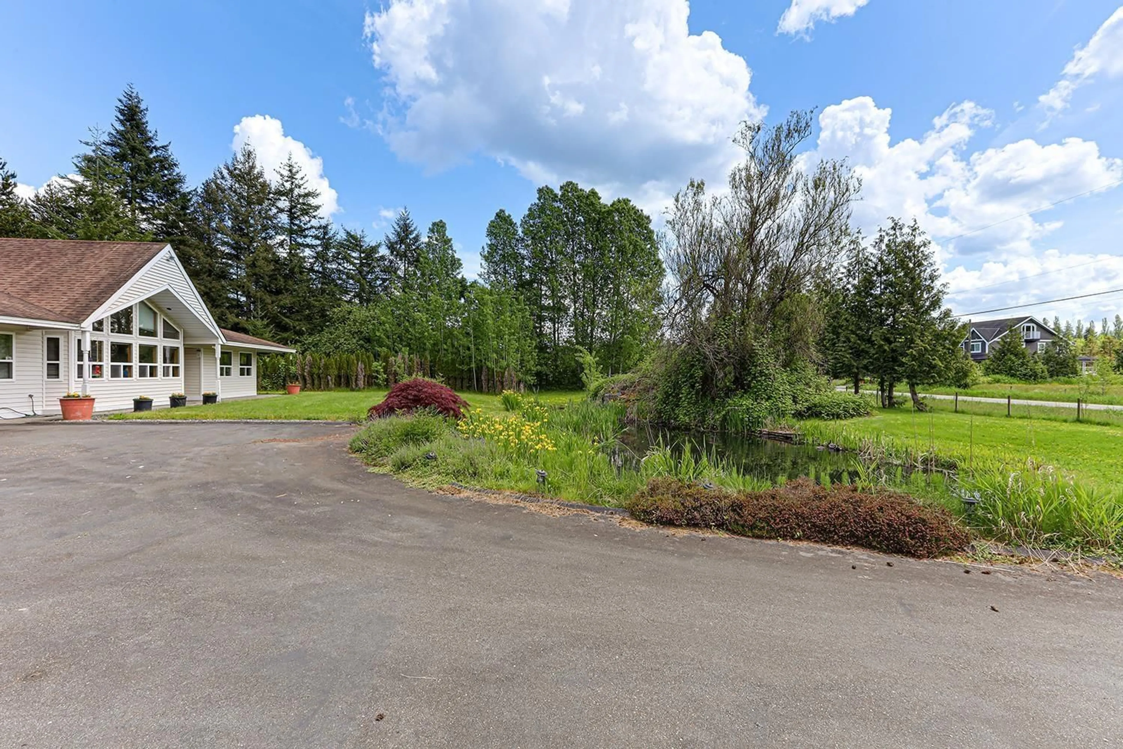 A pic from outside/outdoor area/front of a property/back of a property/a pic from drone, unknown for 22279 57A, Langley British Columbia V2Y2L9