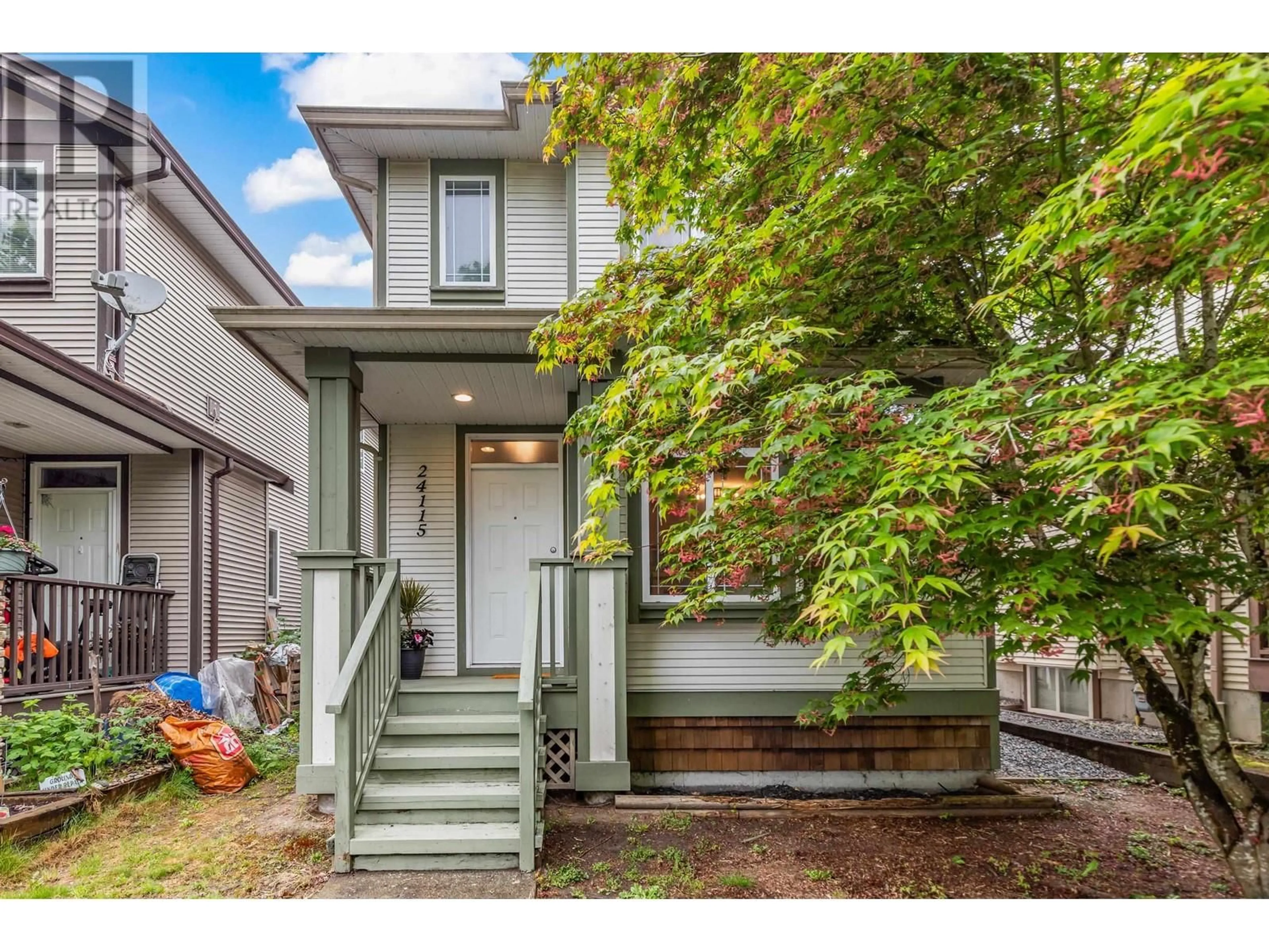 Home with vinyl exterior material, street for 24115 102A AVENUE, Maple Ridge British Columbia V2W2B3