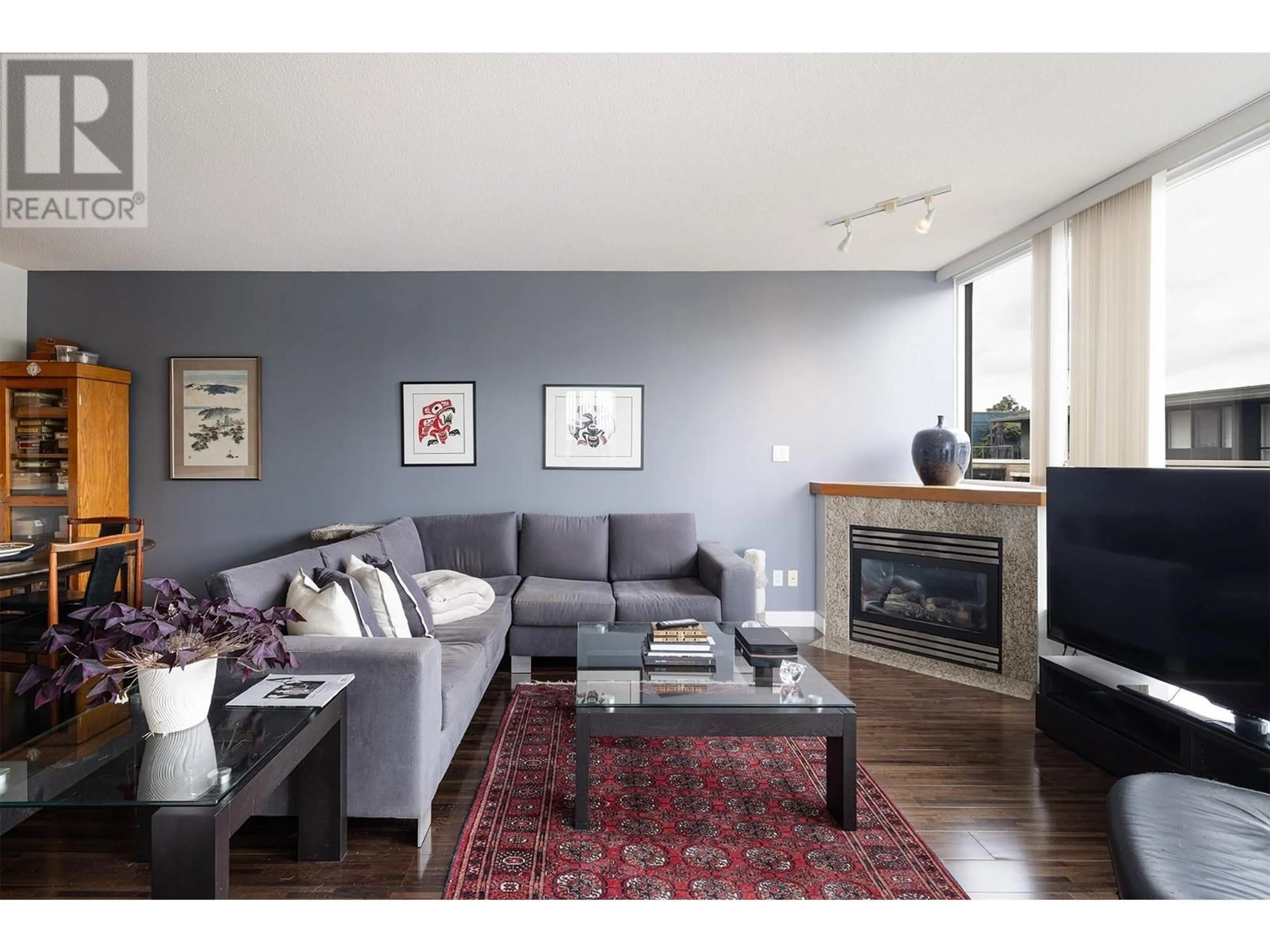 Living room with furniture, wood/laminate floor for 301 - 1483 7TH AVENUE, Vancouver British Columbia V6H4H2