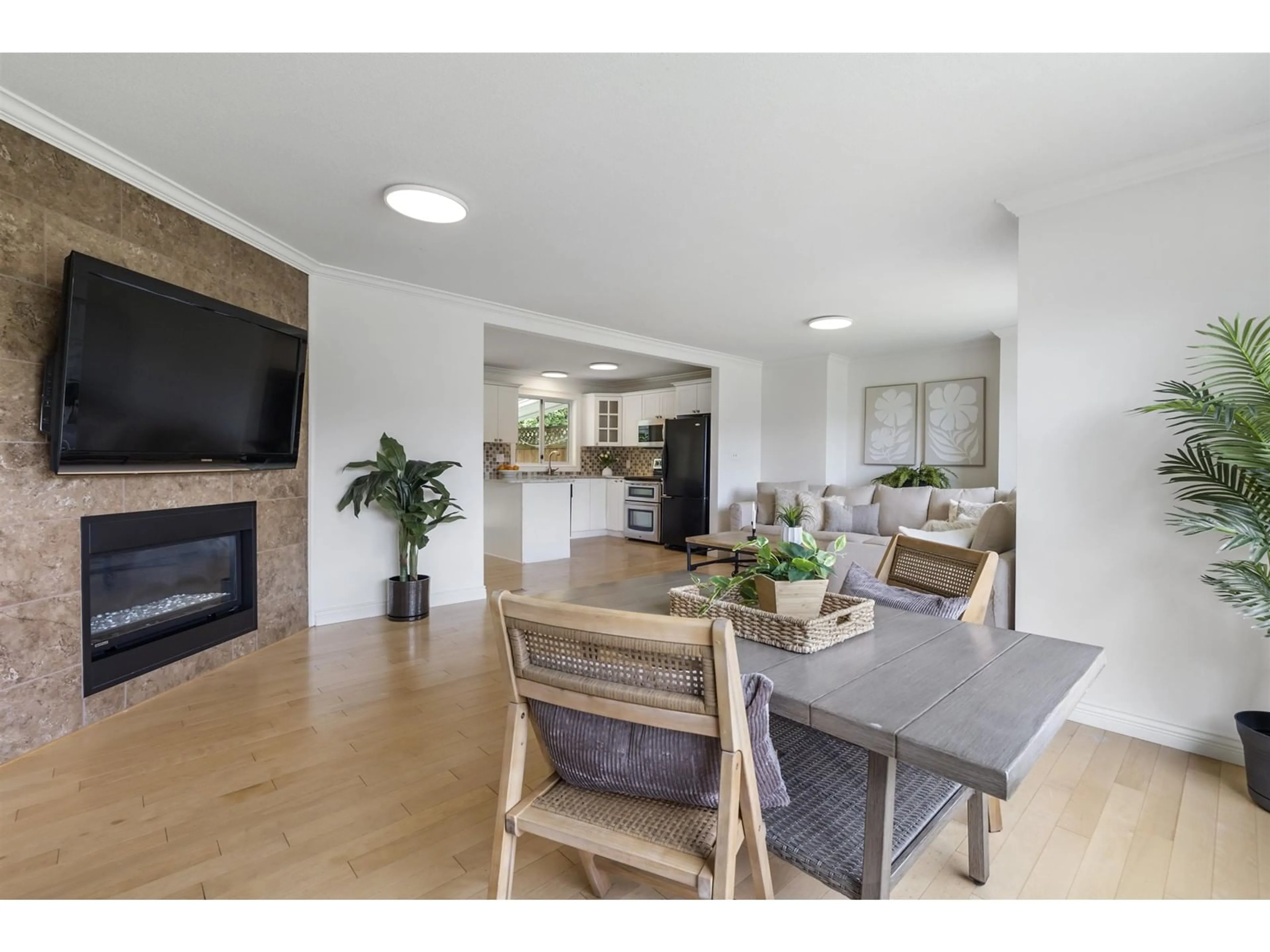 Open concept kitchen, wood/laminate floor for 7275 MEADOWLARK STREET, Chilliwack British Columbia V2R2X1