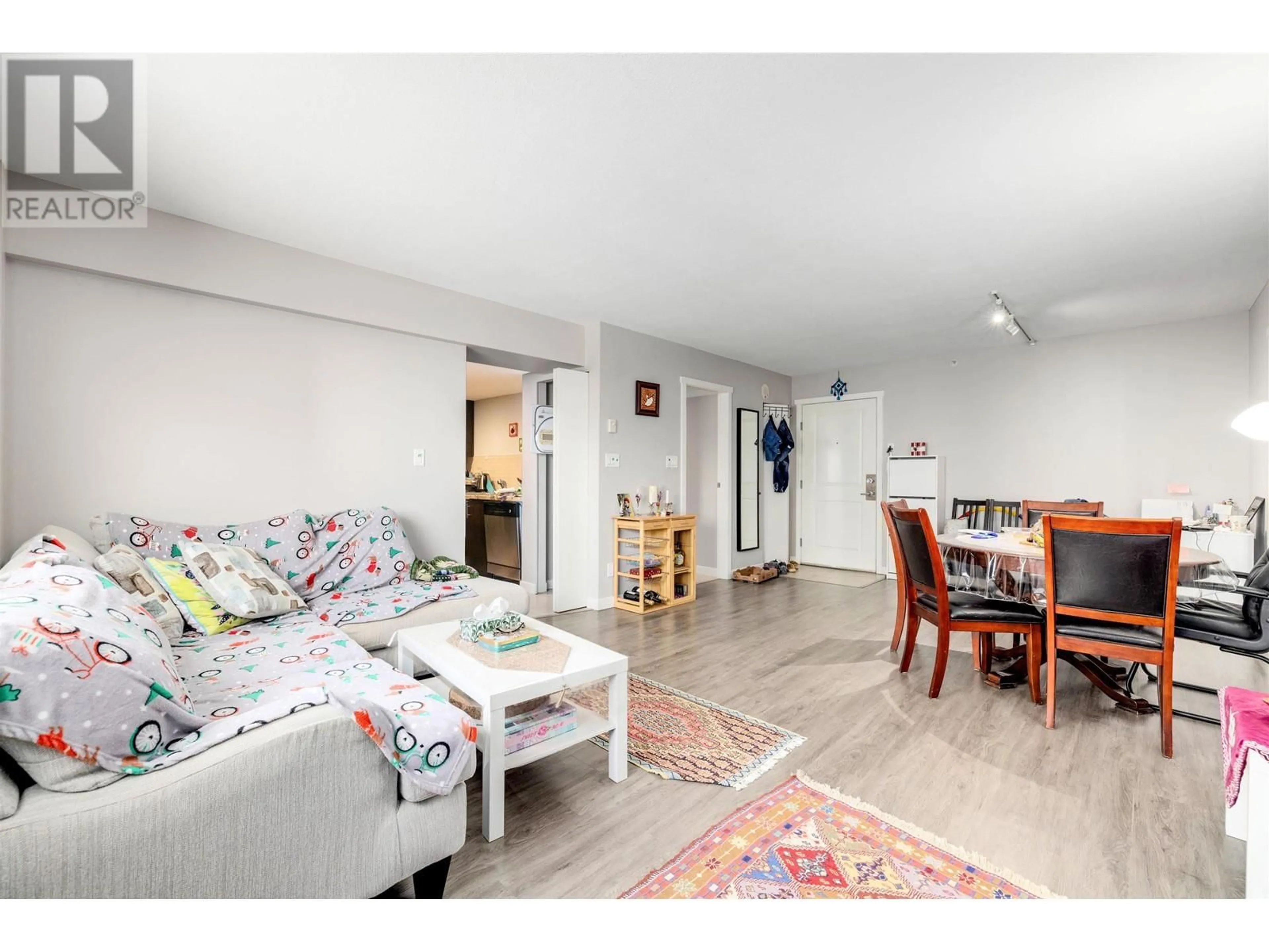 Living room with furniture, unknown for 301 - 200 KEARY STREET, New Westminster British Columbia V3L0A6