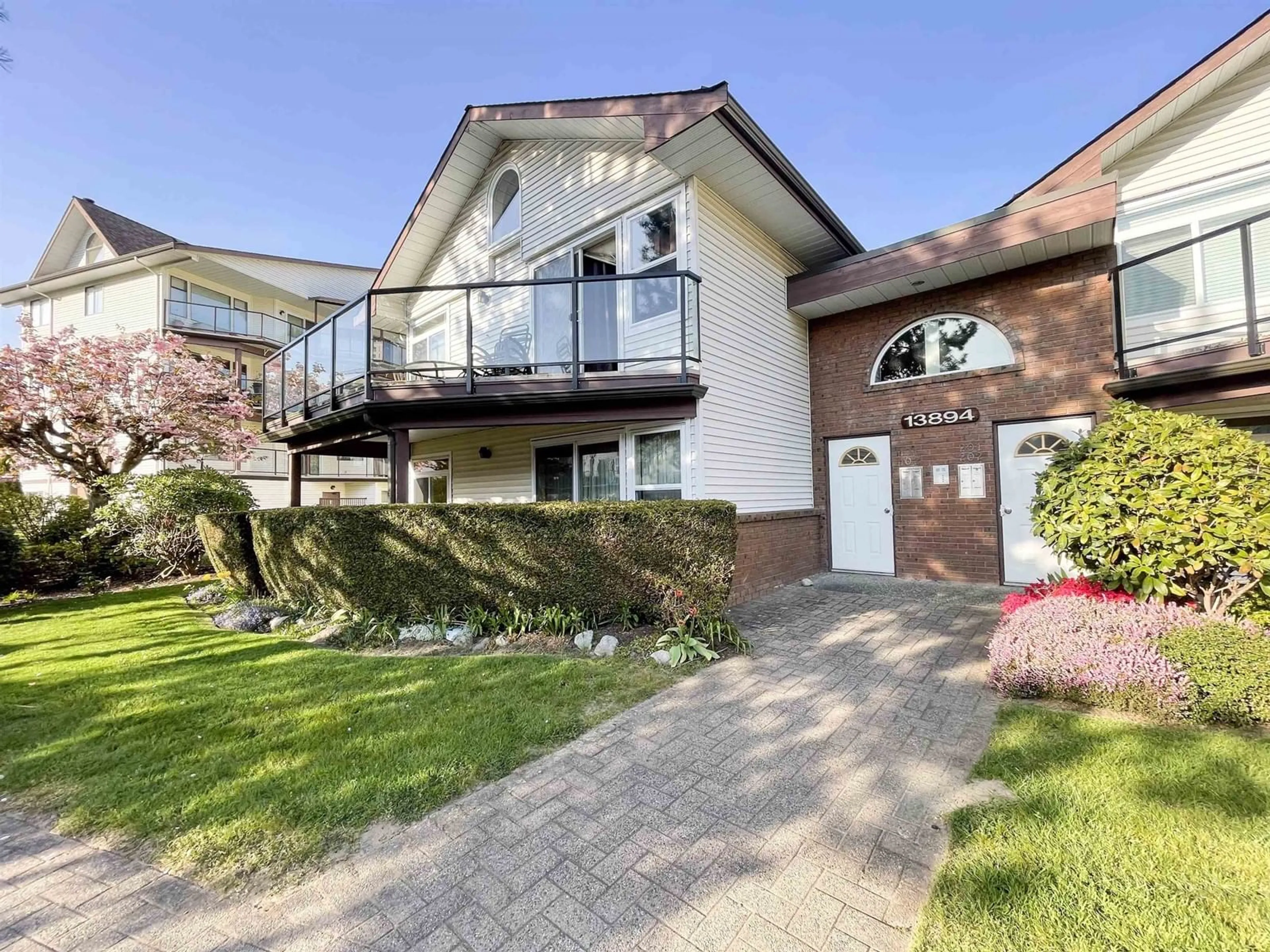 Home with brick exterior material, street for 101 - 13894 102, Surrey British Columbia V3T1P1