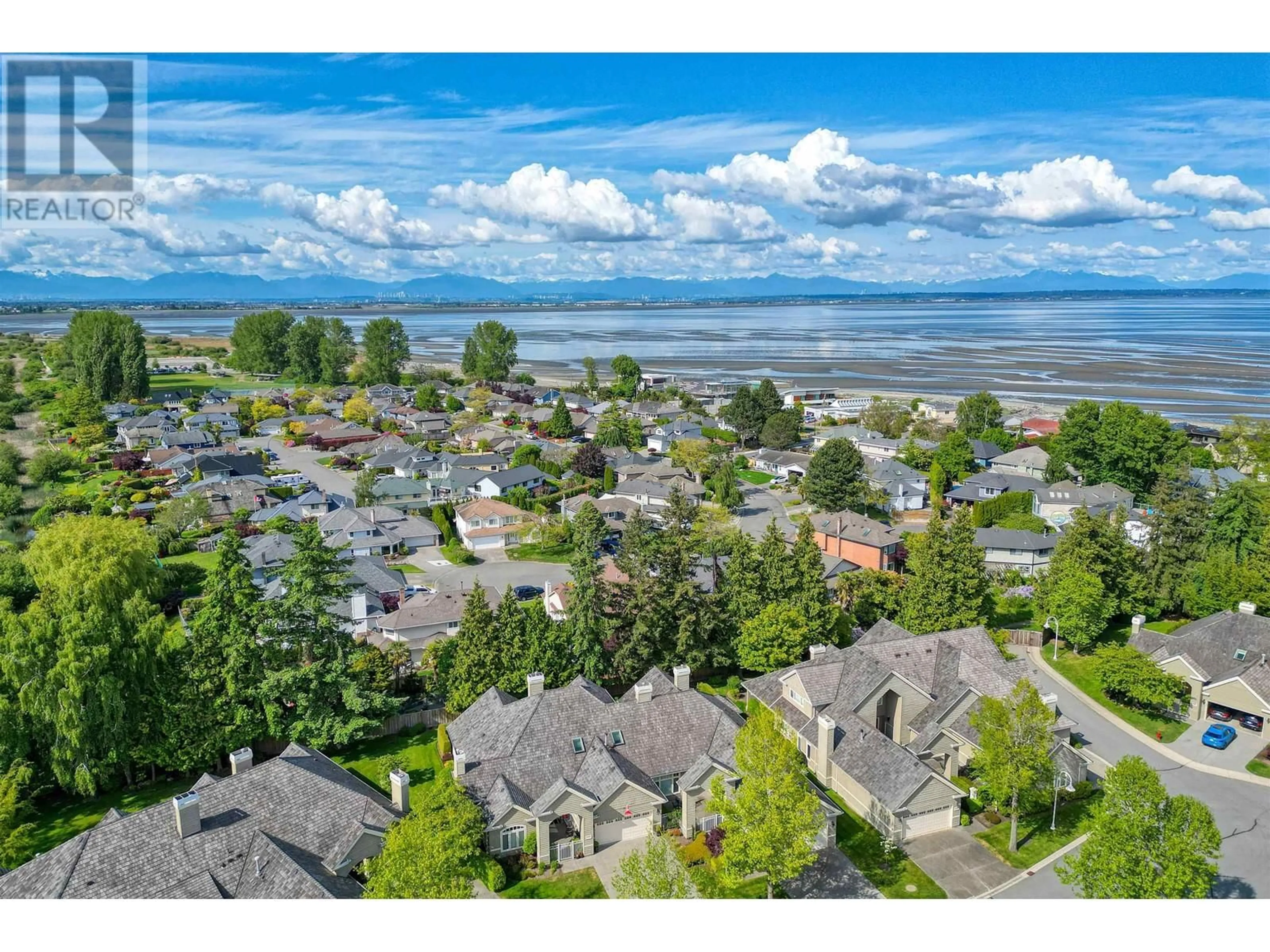 A pic from outside/outdoor area/front of a property/back of a property/a pic from drone, water/lake/river/ocean view for 332 - 6505 3 AVENUE, Delta British Columbia V4L2N1