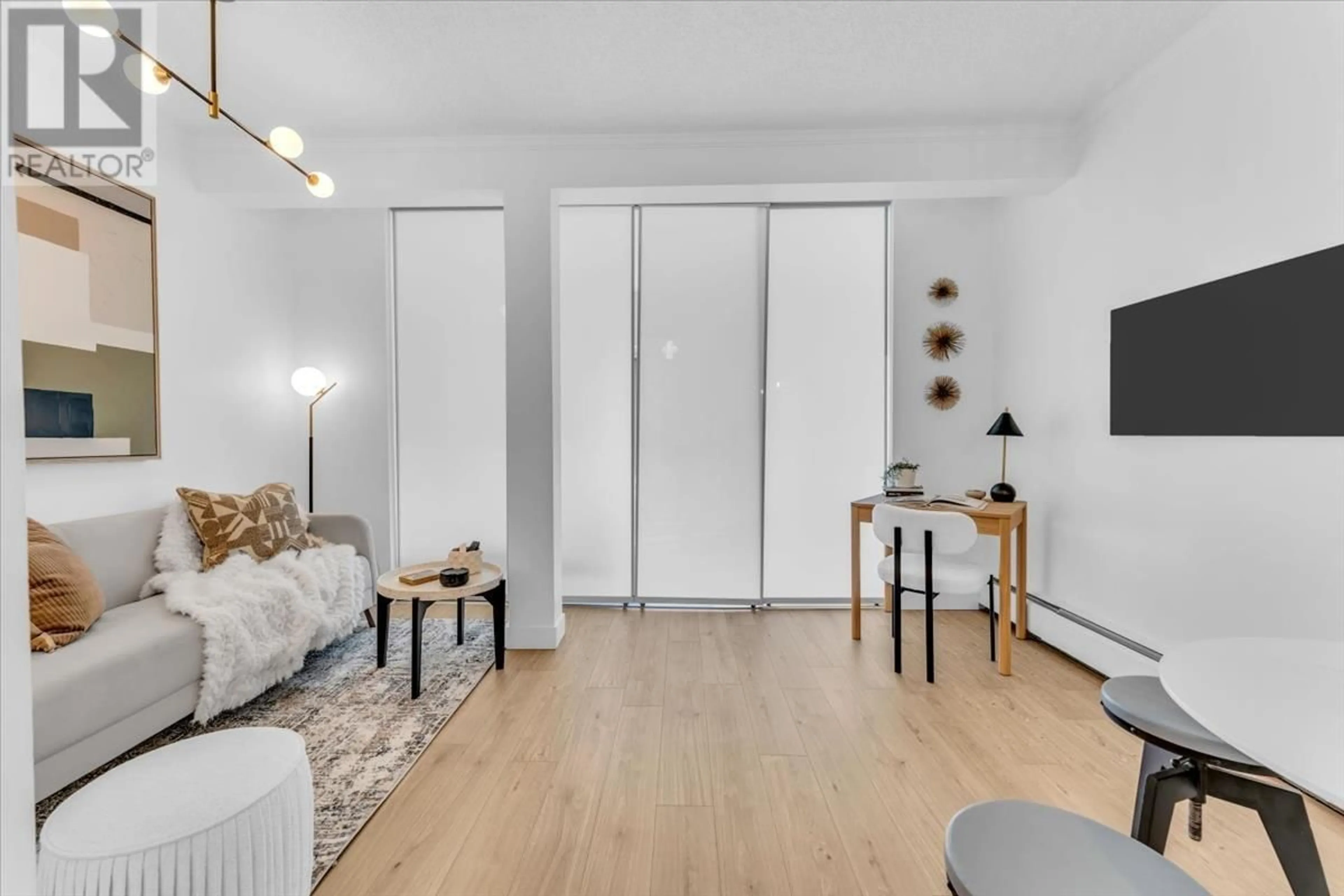 Living room with furniture, wood/laminate floor for 412 - 1655 NELSON STREET, Vancouver British Columbia V6G1M4
