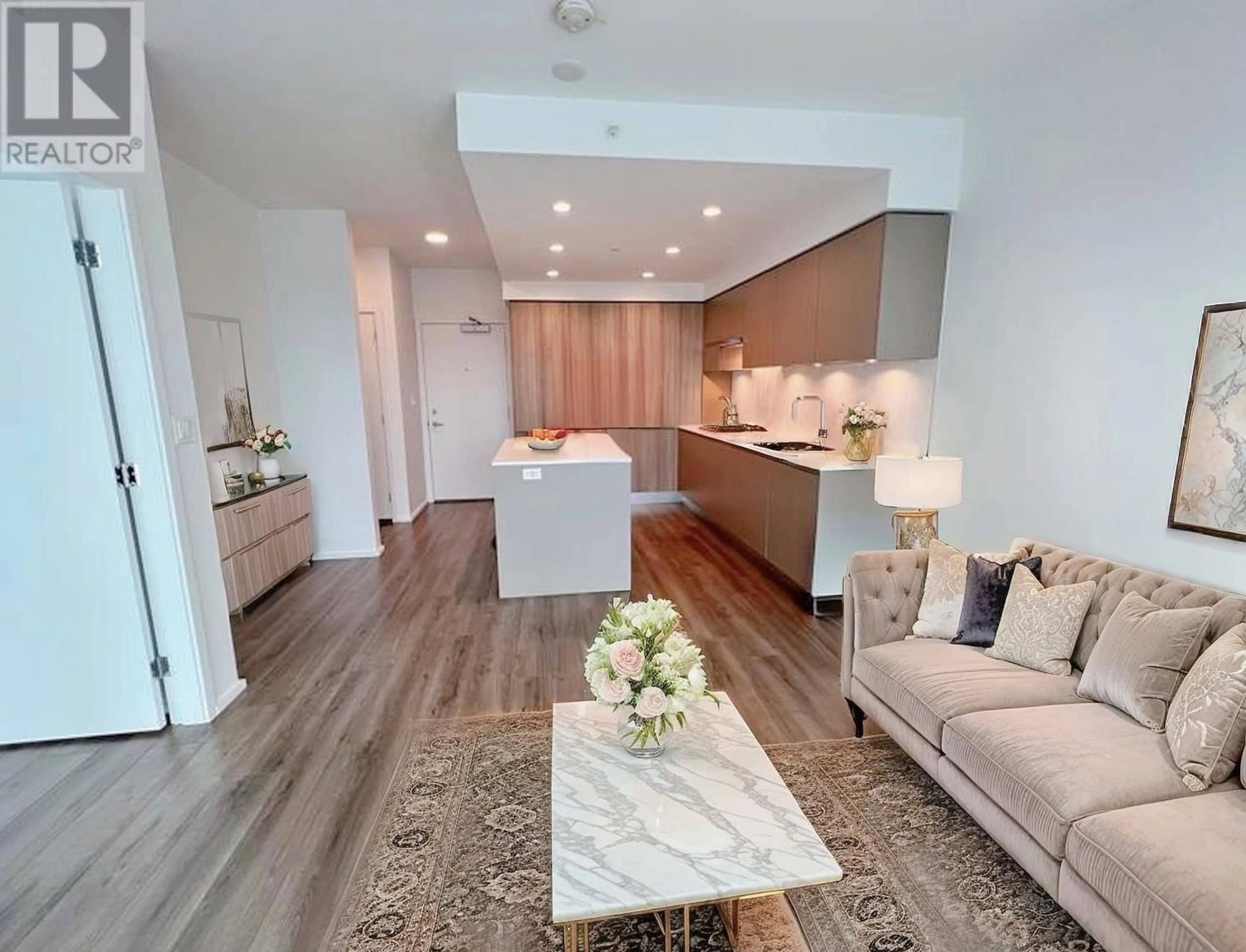 Open concept kitchen, wood/laminate floor for 3203 - 3833 EVERGREEN PLACE, Burnaby British Columbia V3J0M2