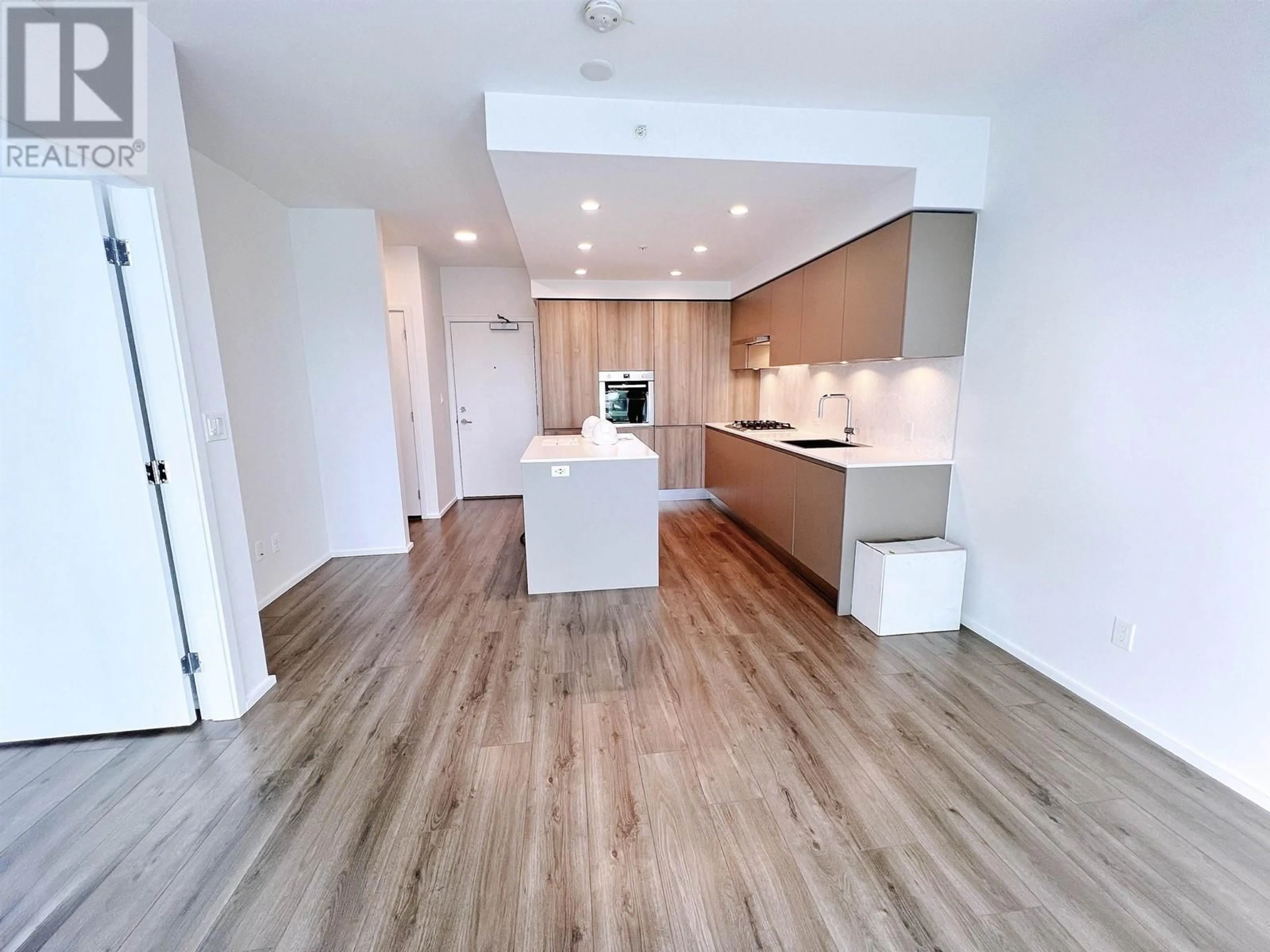 Open concept kitchen, wood/laminate floor for 3203 - 3833 EVERGREEN PLACE, Burnaby British Columbia V3J0M2