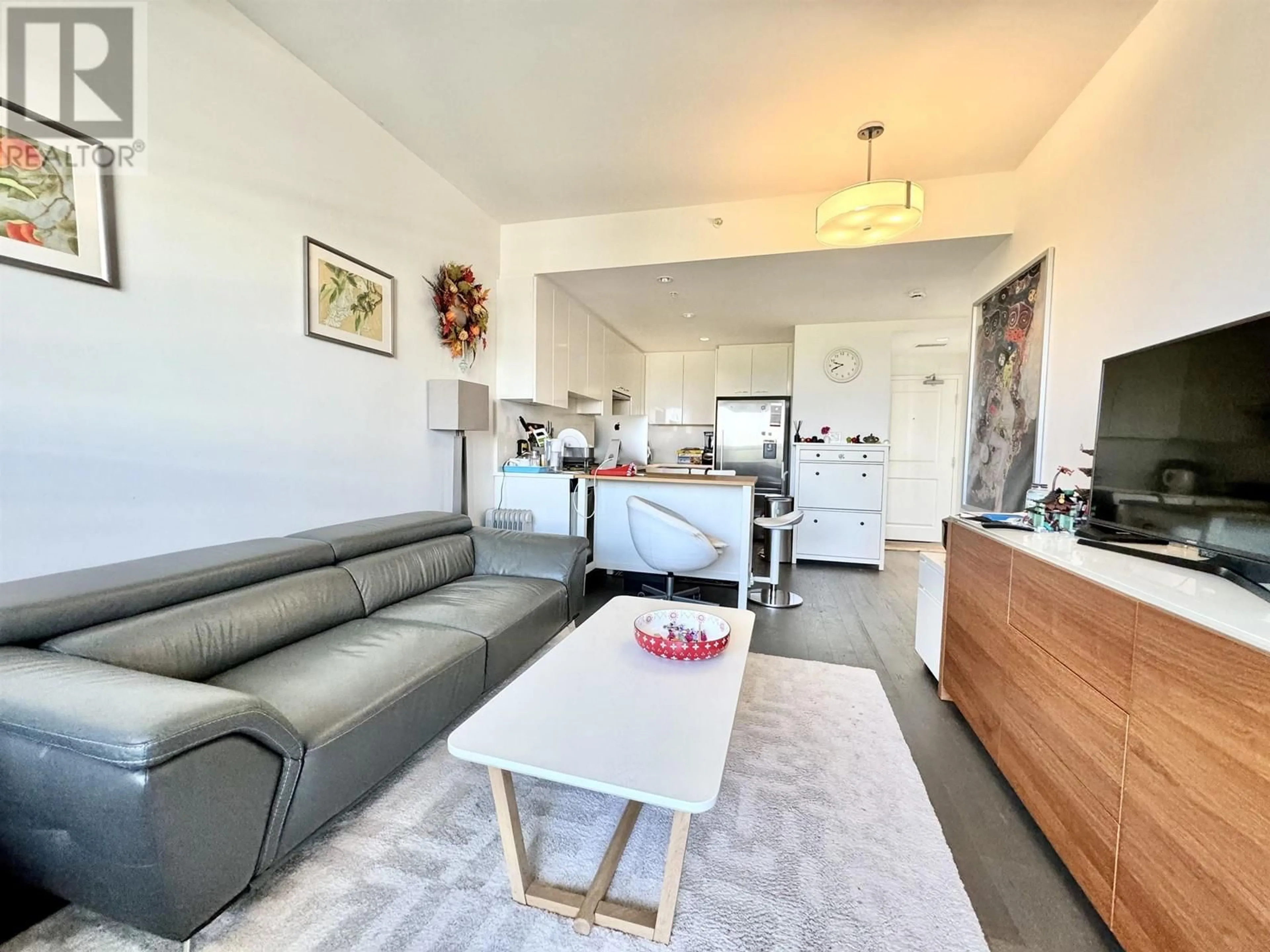 Living room with furniture, unknown for 703 - 6383 CAMBIE STREET, Vancouver British Columbia V5Z0G7