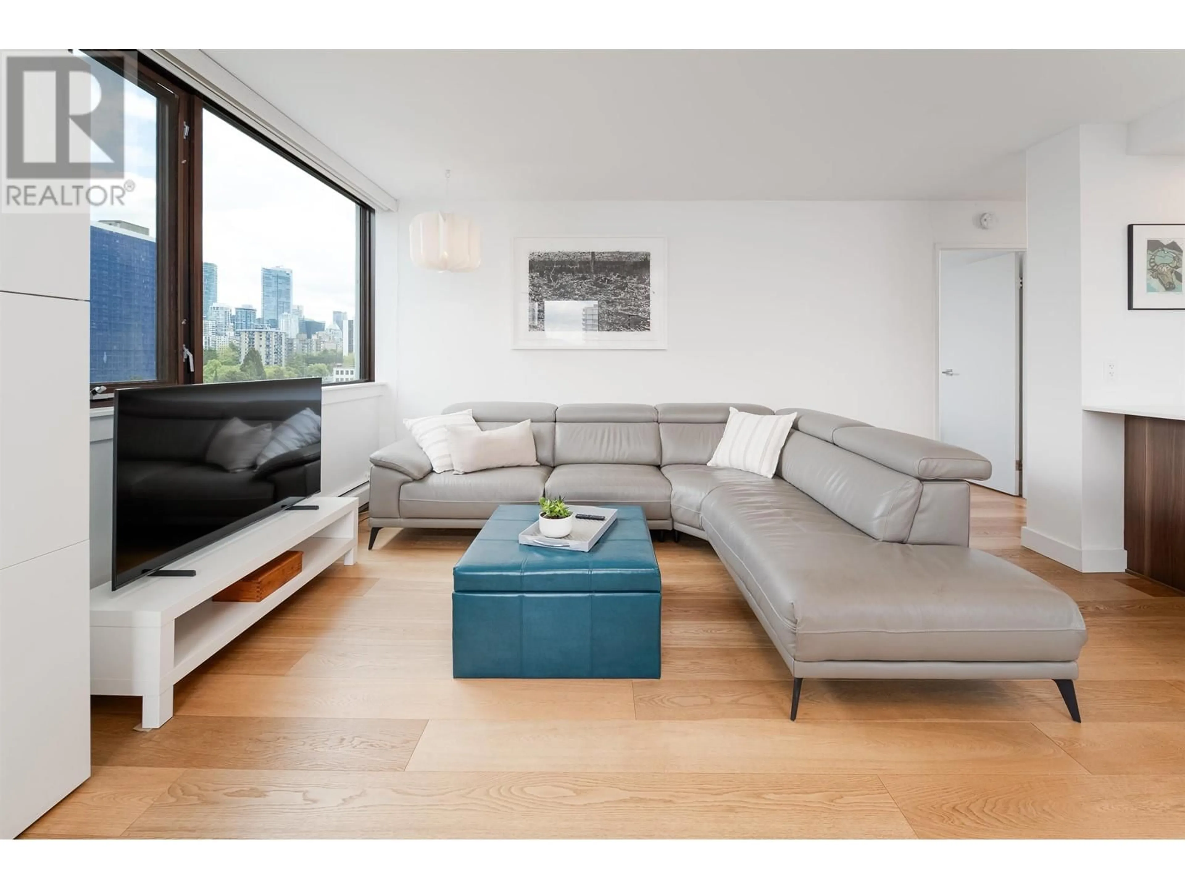 Living room with furniture, wood/laminate floor for 1104 - 1725 PENDRELL STREET, Vancouver British Columbia V6G2X7