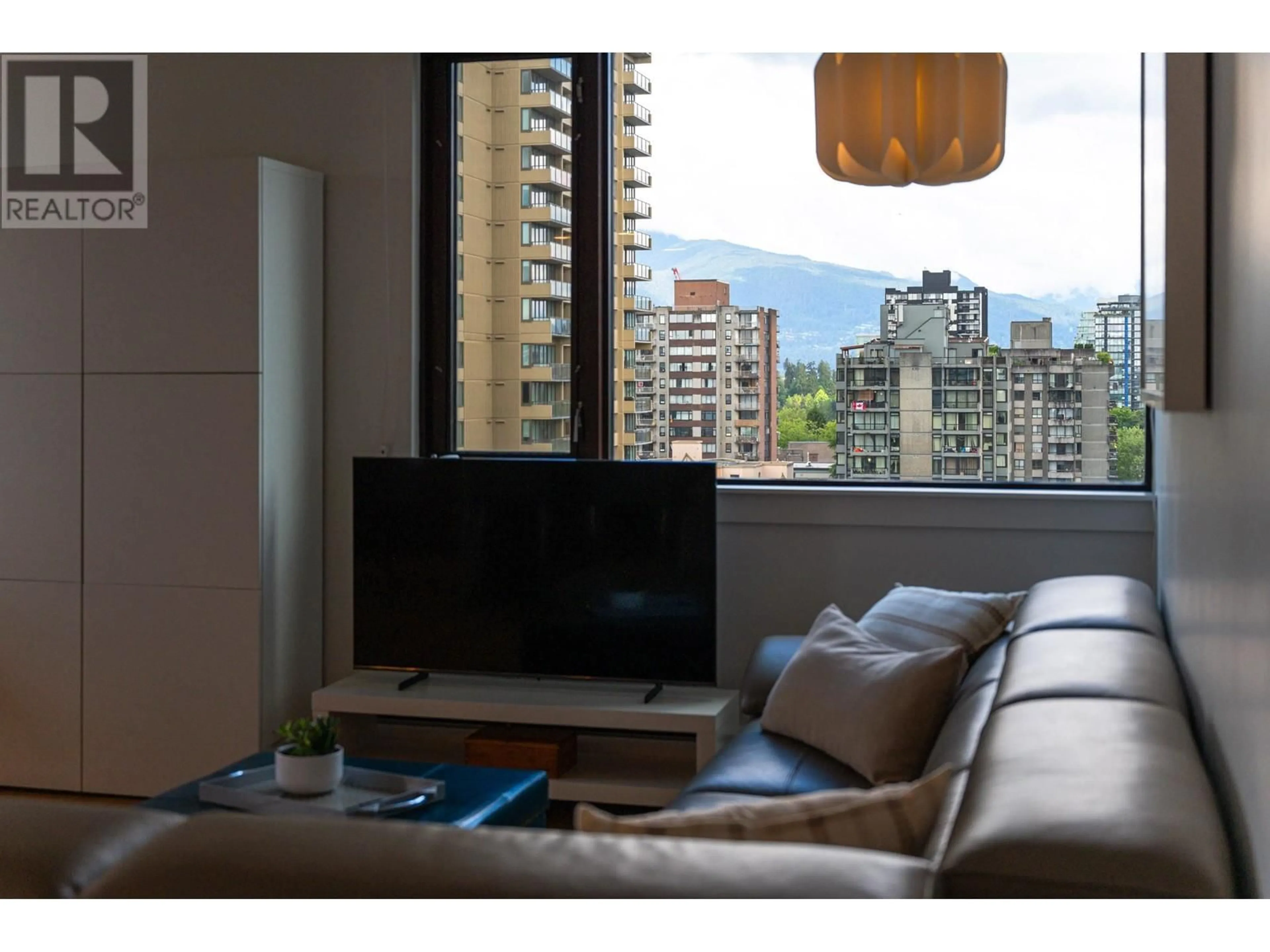 Living room with furniture, wood/laminate floor for 1104 - 1725 PENDRELL STREET, Vancouver British Columbia V6G2X7