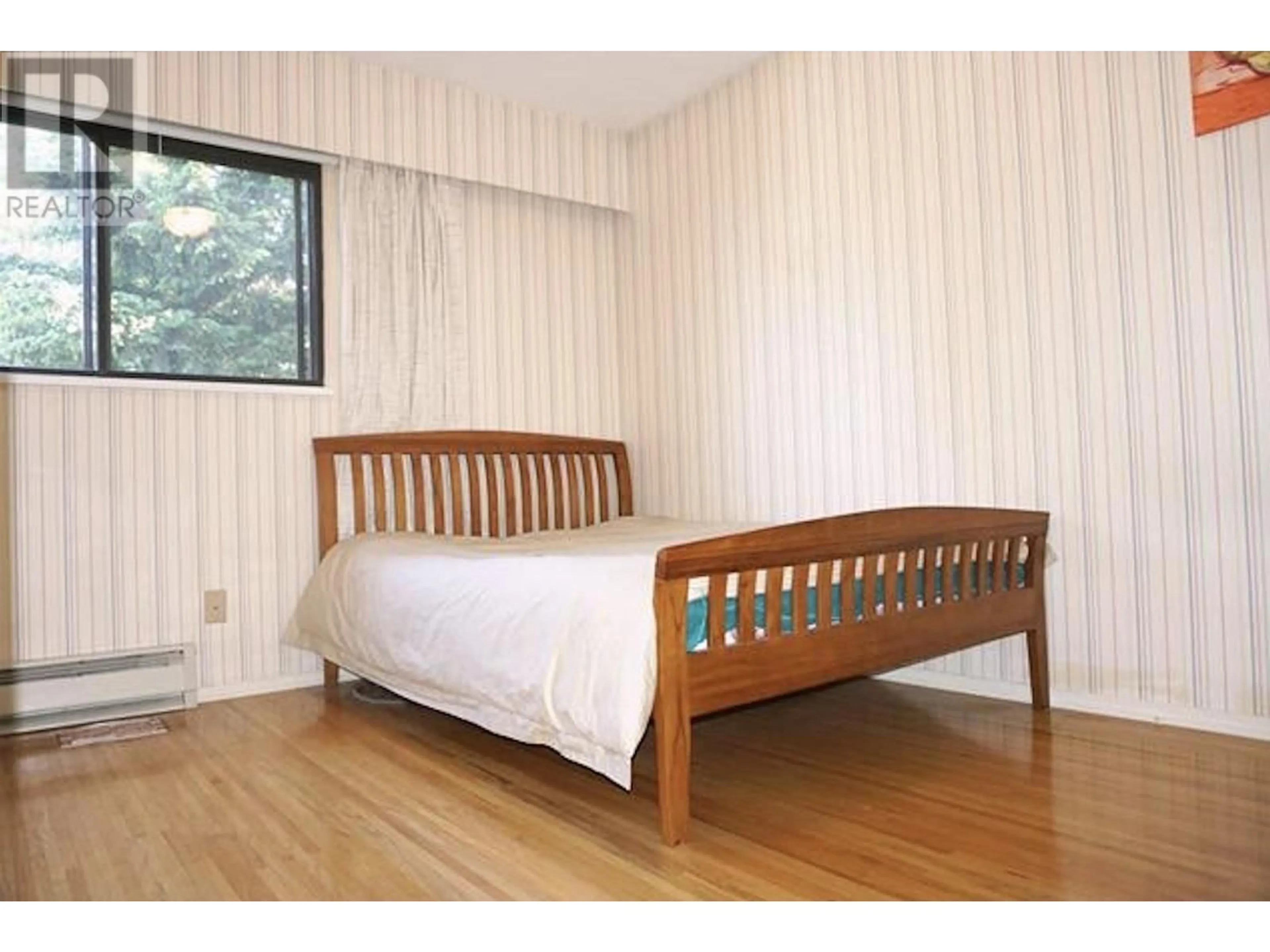 Bedroom with bed, wood/laminate floor for 8160 ROSEBANK CRESCENT, Richmond British Columbia V7A2K6