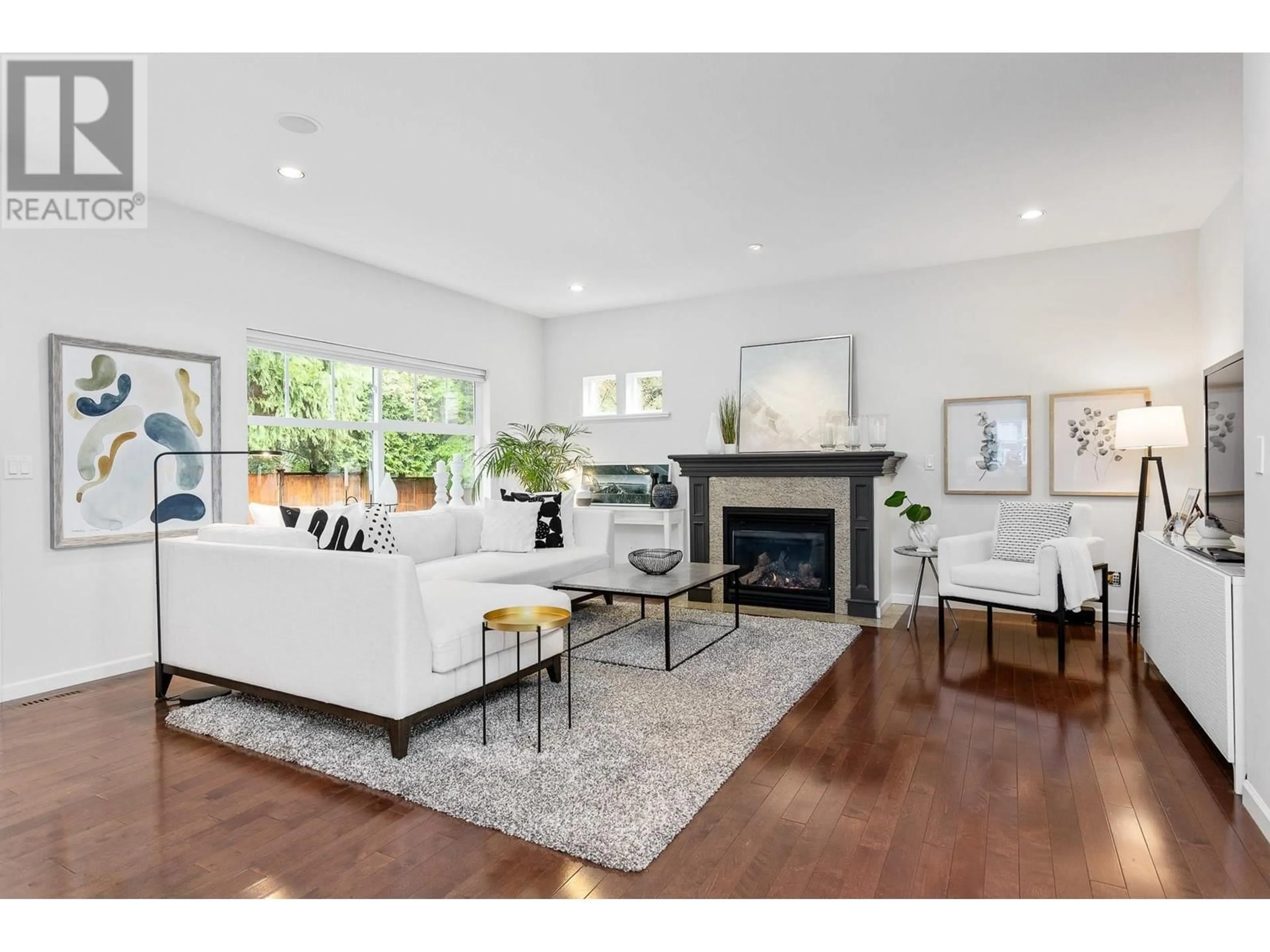 Living room with furniture, wood/laminate floor for 3293 CANTERBURY LANE, Coquitlam British Columbia V3B8E6