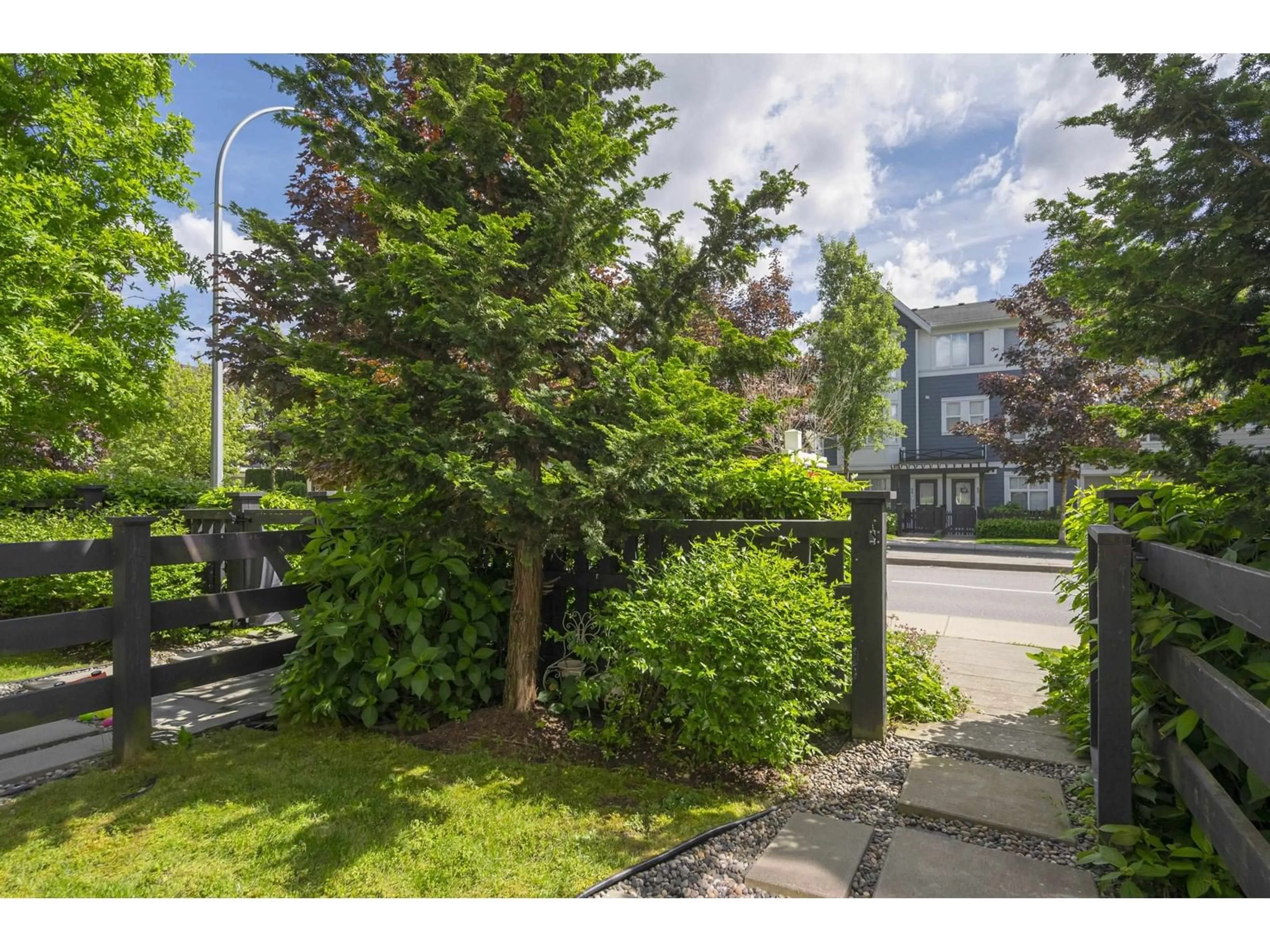 A pic from outside/outdoor area/front of a property/back of a property/a pic from drone, street for #5 - 20857 77A, Langley British Columbia V2Y0W7