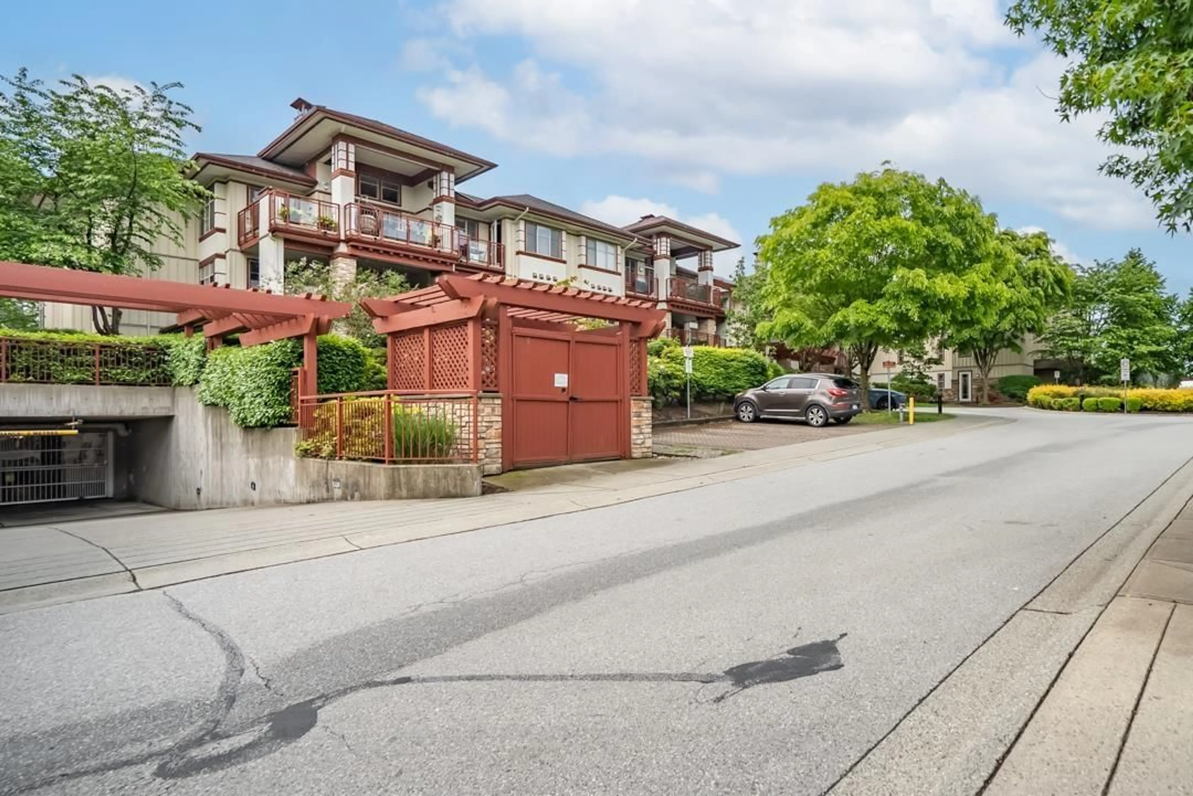 A pic from outside/outdoor area/front of a property/back of a property/a pic from drone, street for 204 - 16421 64, Surrey British Columbia V3S6V7