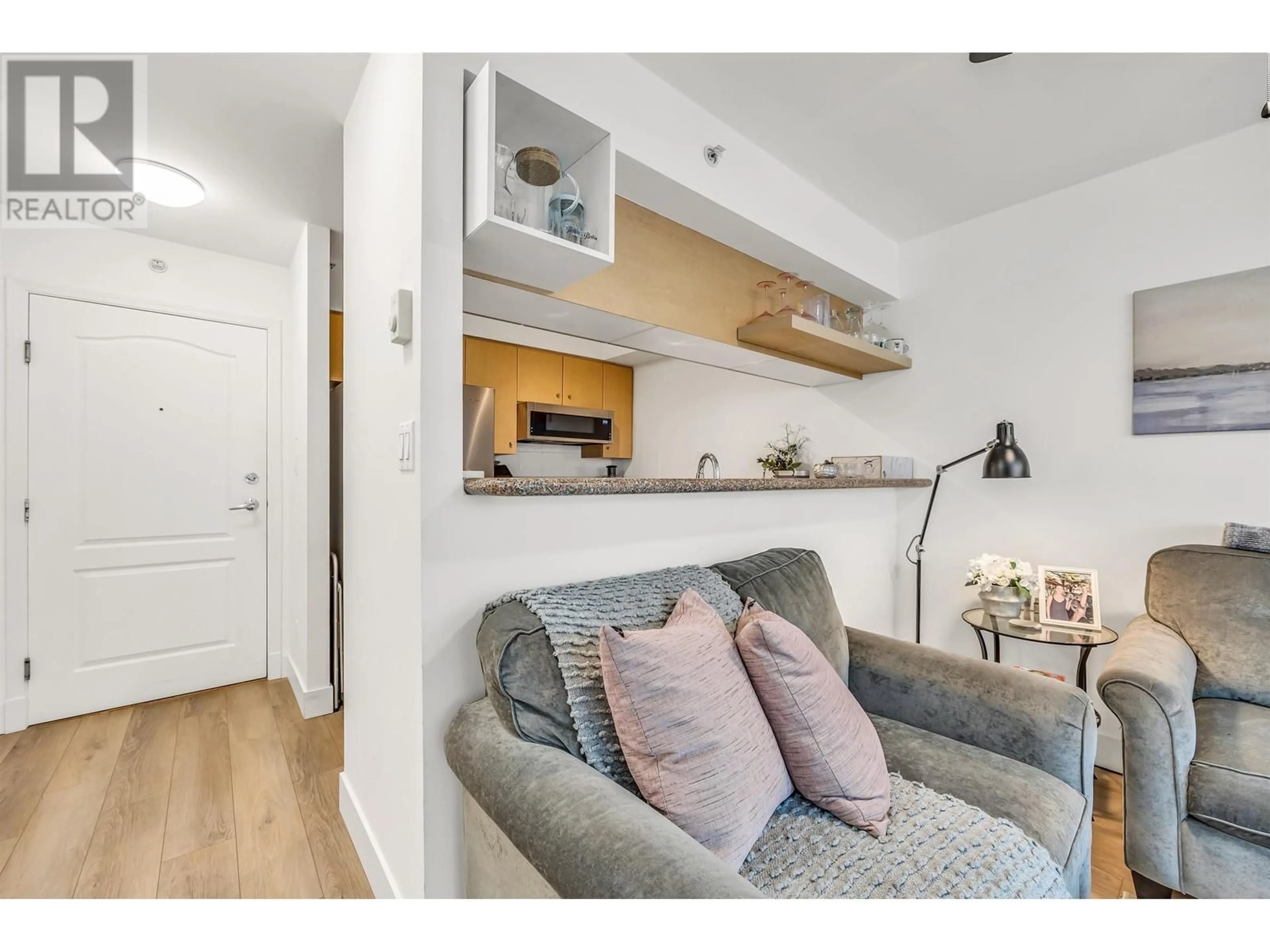 Living room with furniture, wood/laminate floor for 401 - 822 HOMER STREET, Vancouver British Columbia V6B6M3